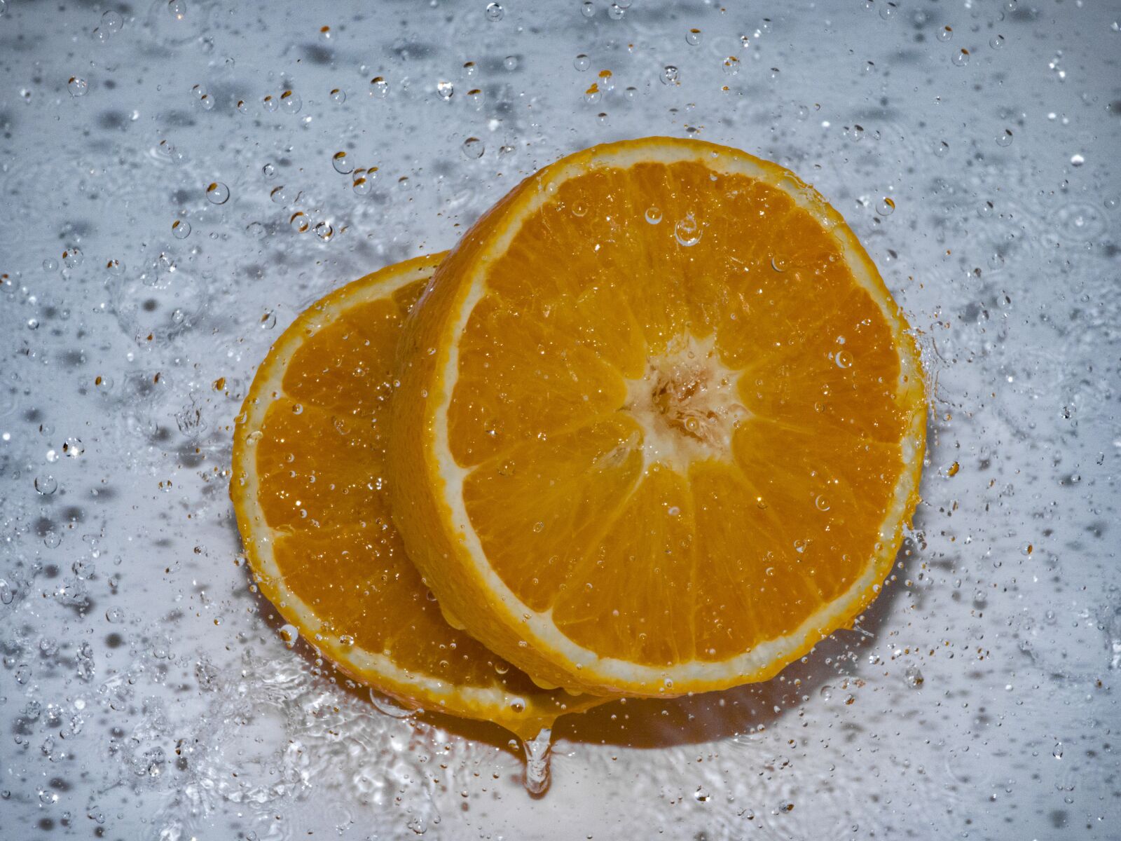 Panasonic DMC-FZ72 sample photo. Orange, splash, slowmotion photography