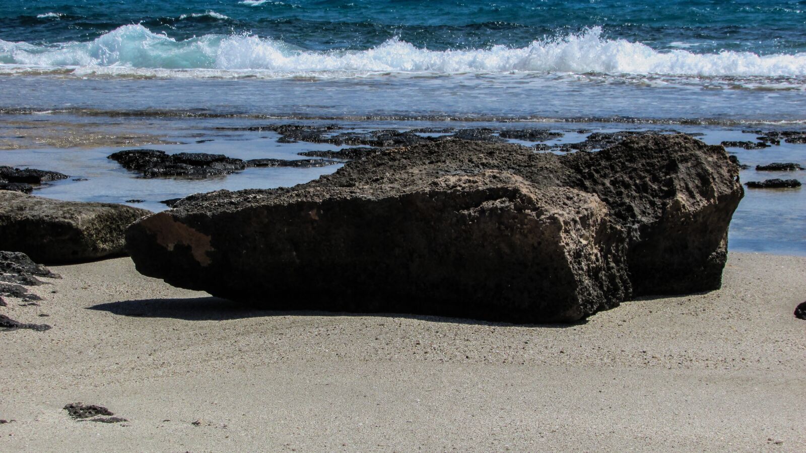 Canon PowerShot SX400 IS sample photo. Rock, beach, sand photography