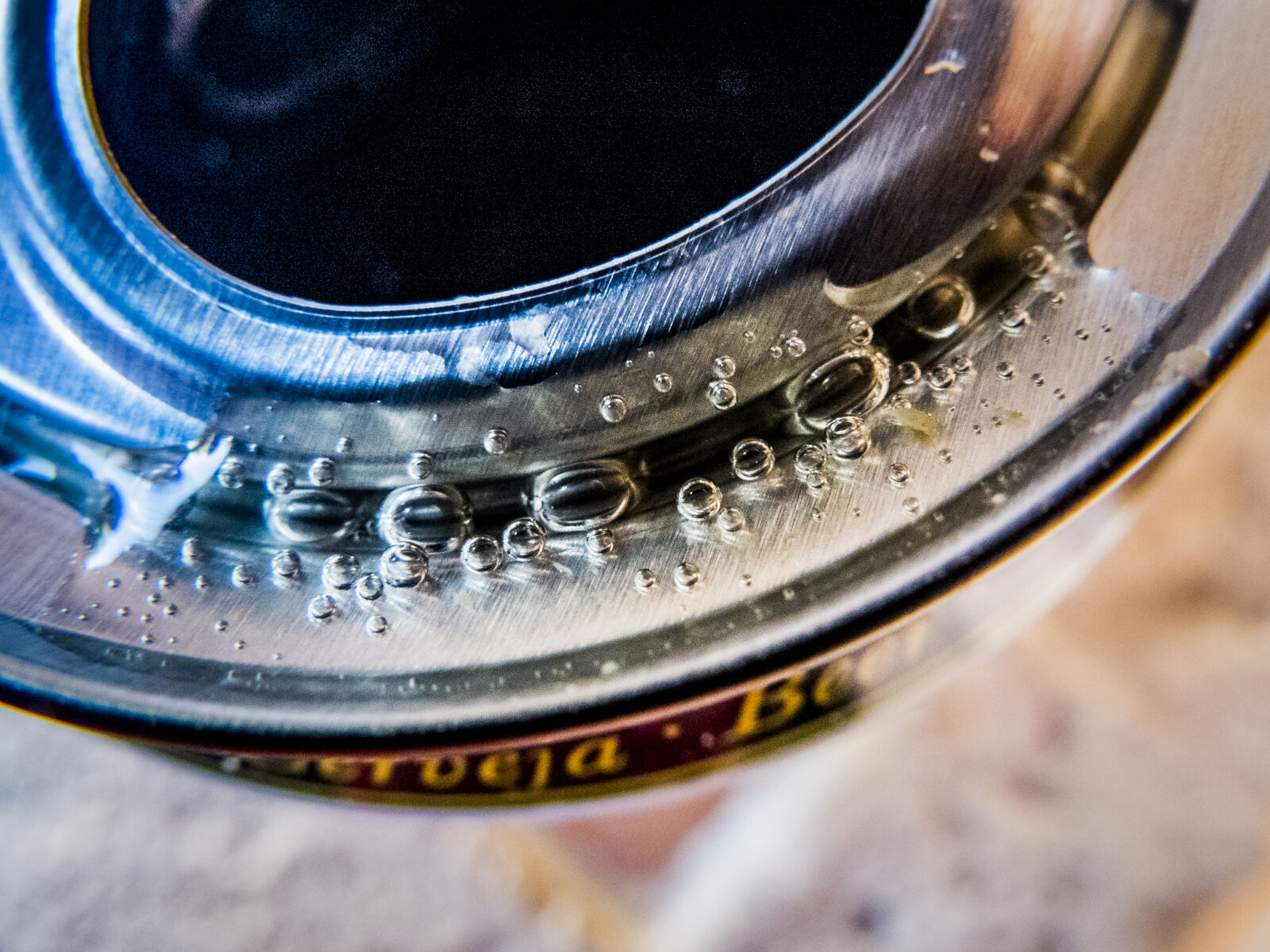 Fujifilm X10 sample photo. Beer, bubble, metal, shape photography