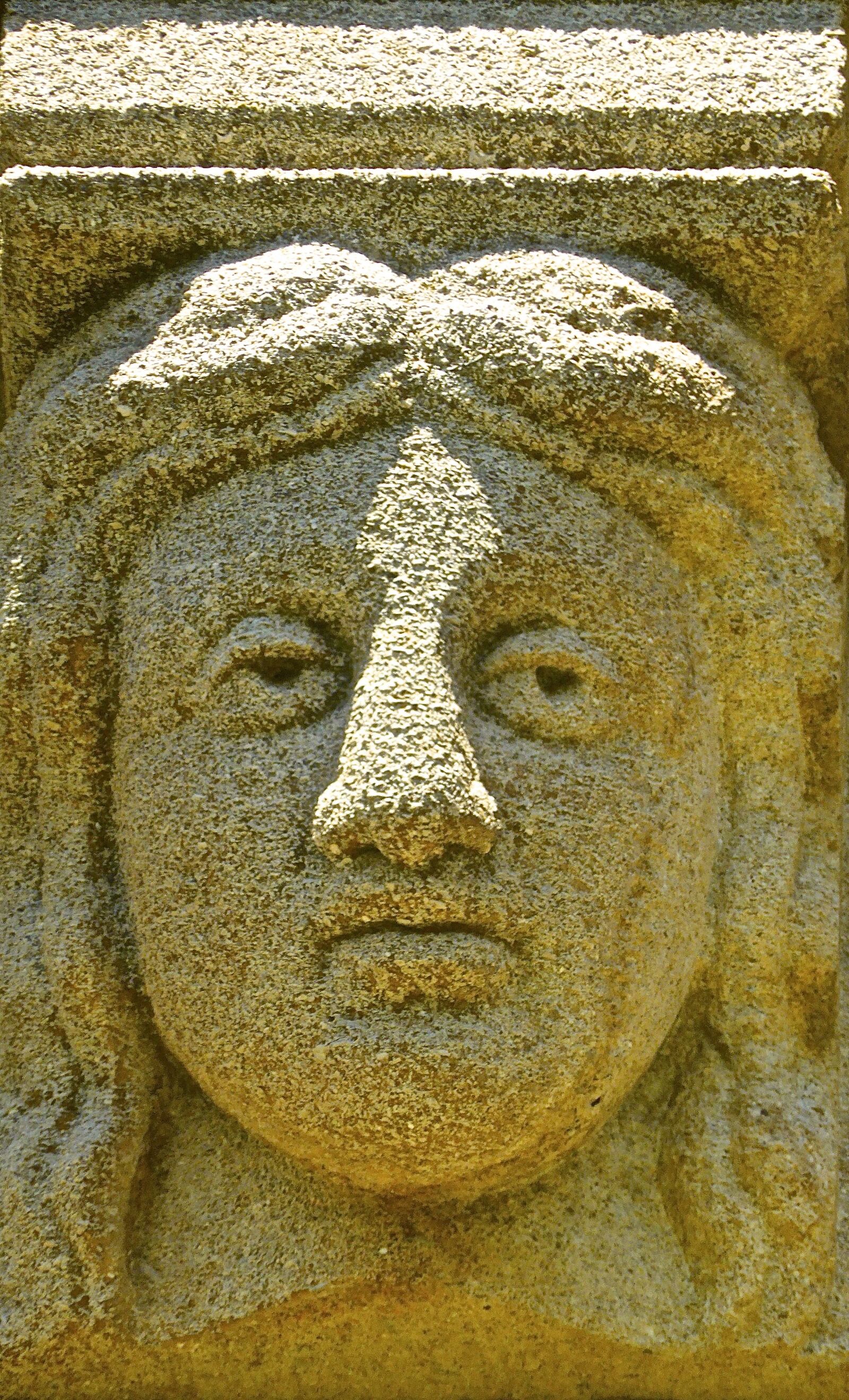 Panasonic DMC-TZ41 sample photo. Face, stone, carving photography