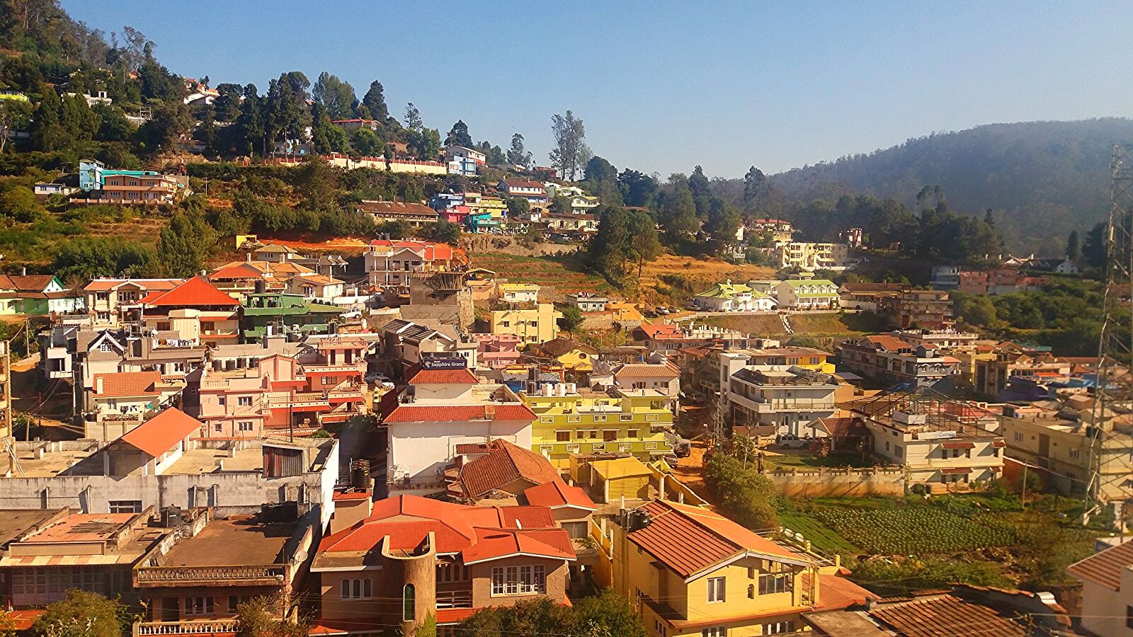 Samsung Galaxy J5 sample photo. Colorful, houses, hill, station photography