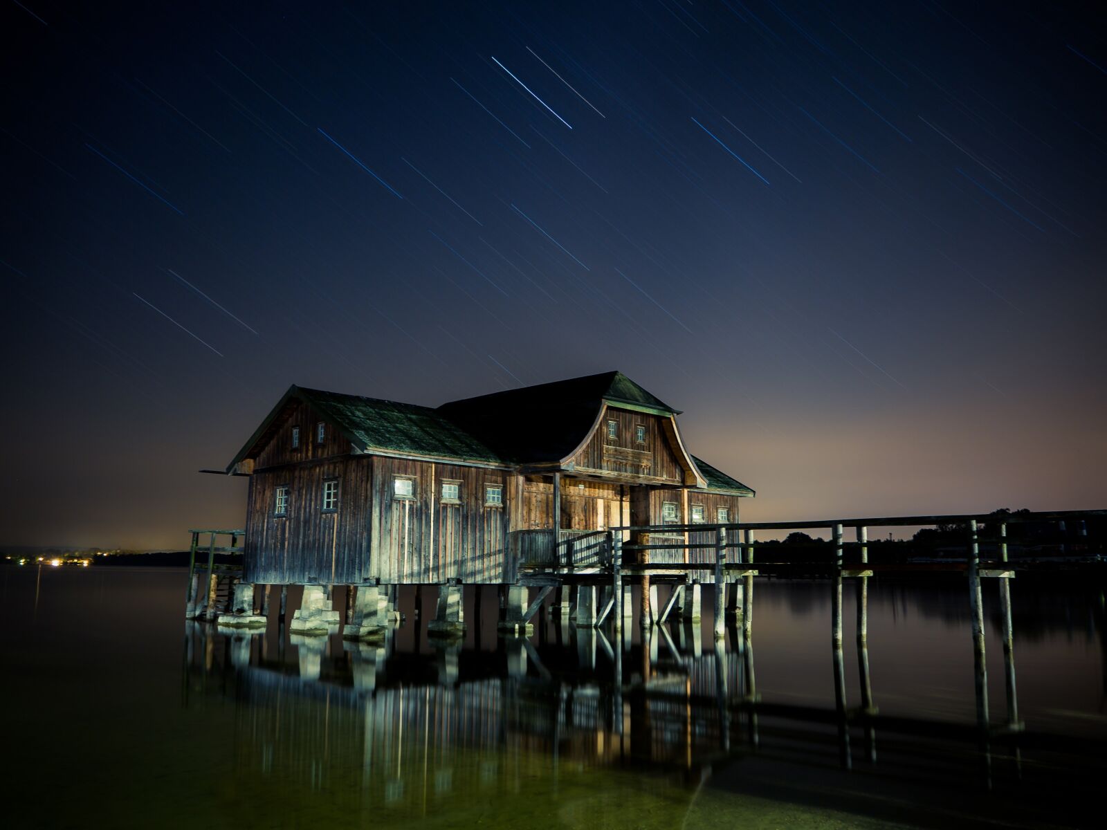 Olympus OM-D E-M10 II sample photo. Hut, stilt houses, star photography