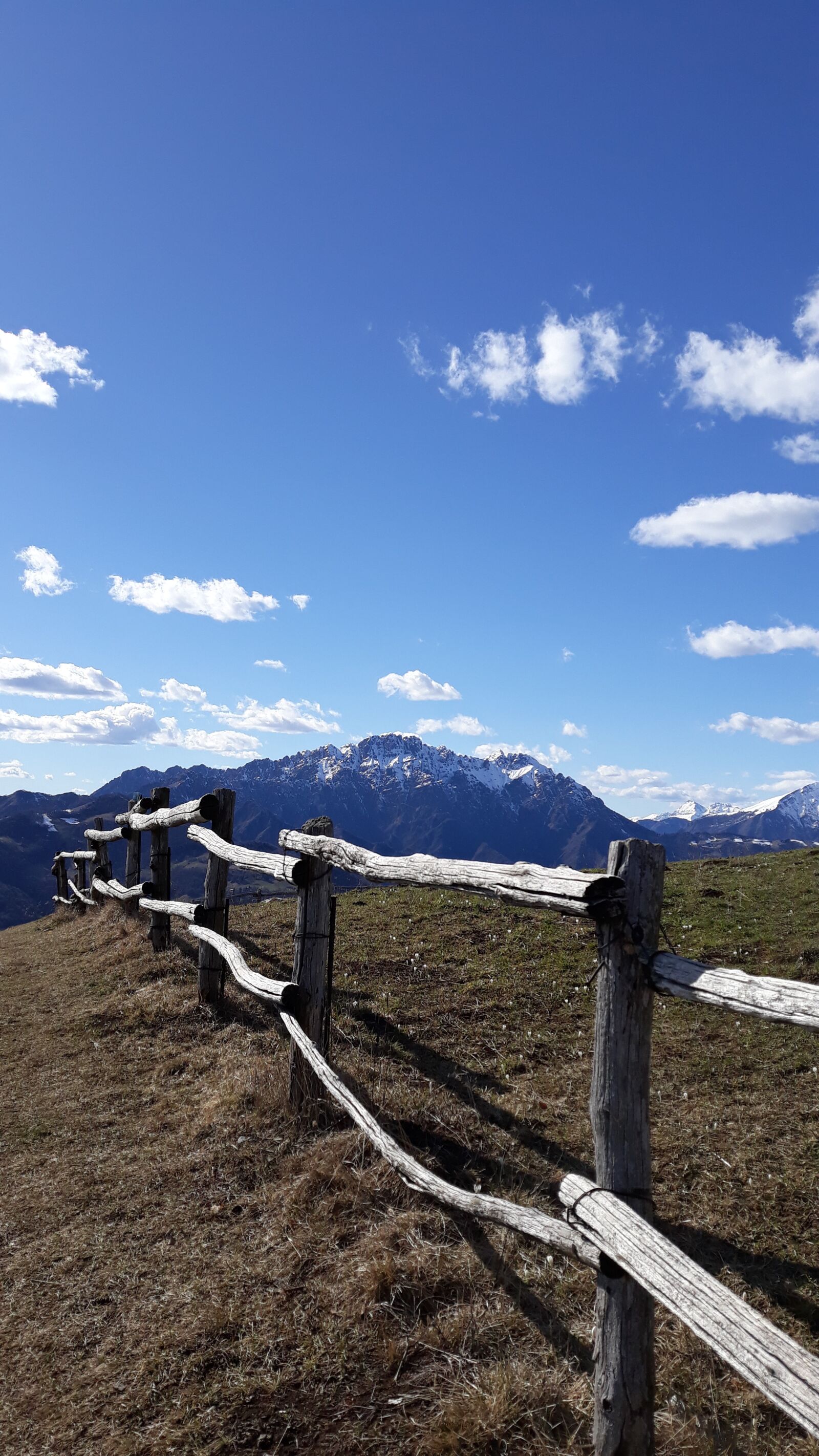 Samsung Galaxy J7 sample photo. Clouds, sky, fence photography
