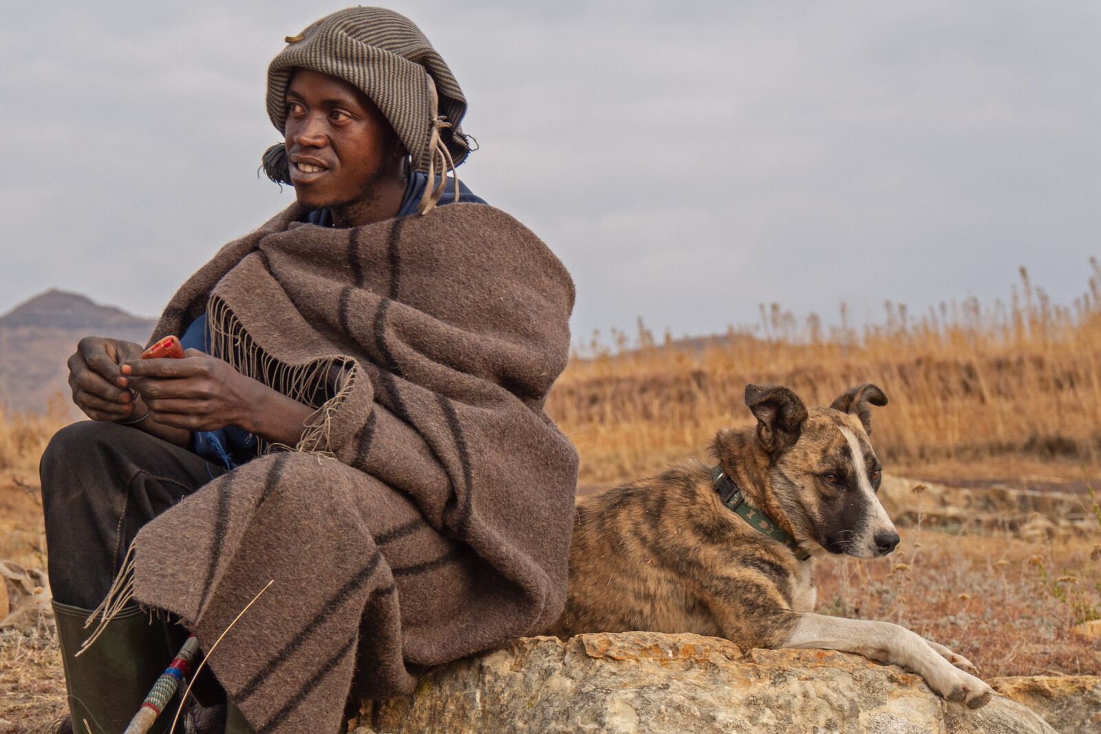 Panasonic Lumix DMC-GH3 + Panasonic Lumix G Vario 14-140mm F3.5-5.6 ASPH Power O.I.S sample photo. Lesotho, shepherd boy, portrait photography