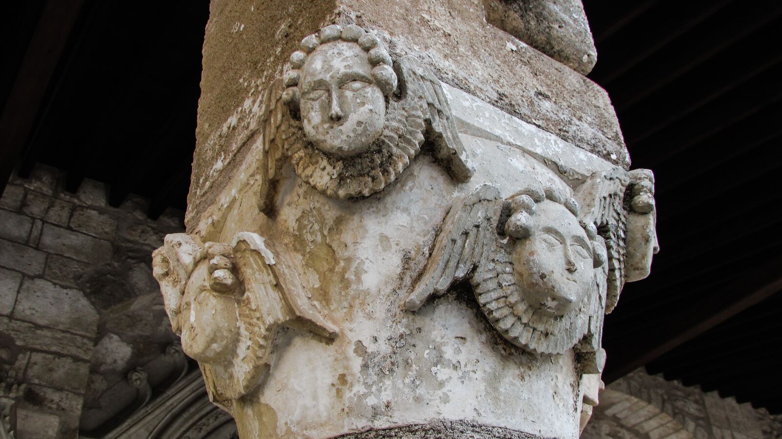 Canon PowerShot SX400 IS sample photo. Sculpted pillar, angels, church photography