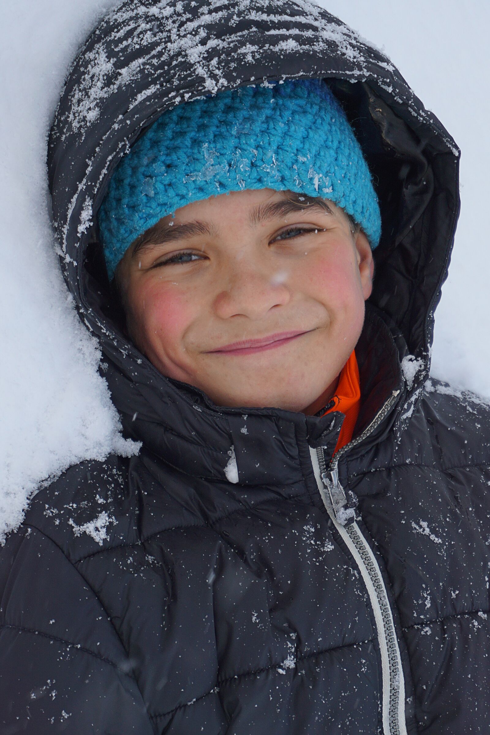 Sony a5100 sample photo. Boy, snow, anorak photography