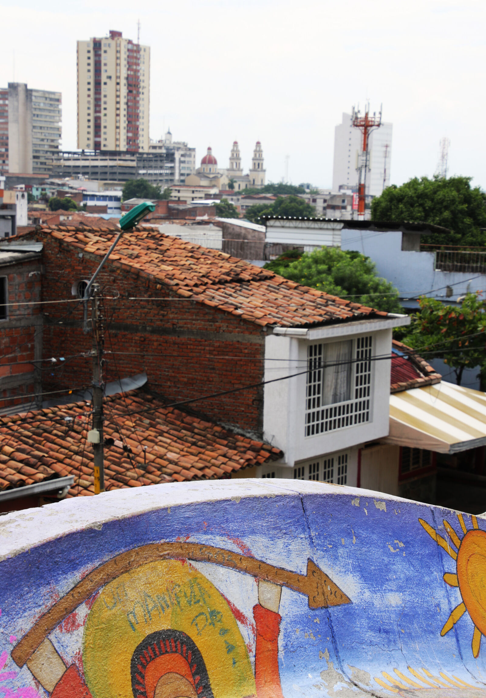 Canon EOS 7D Mark II sample photo. Arrow, blue, church, city photography