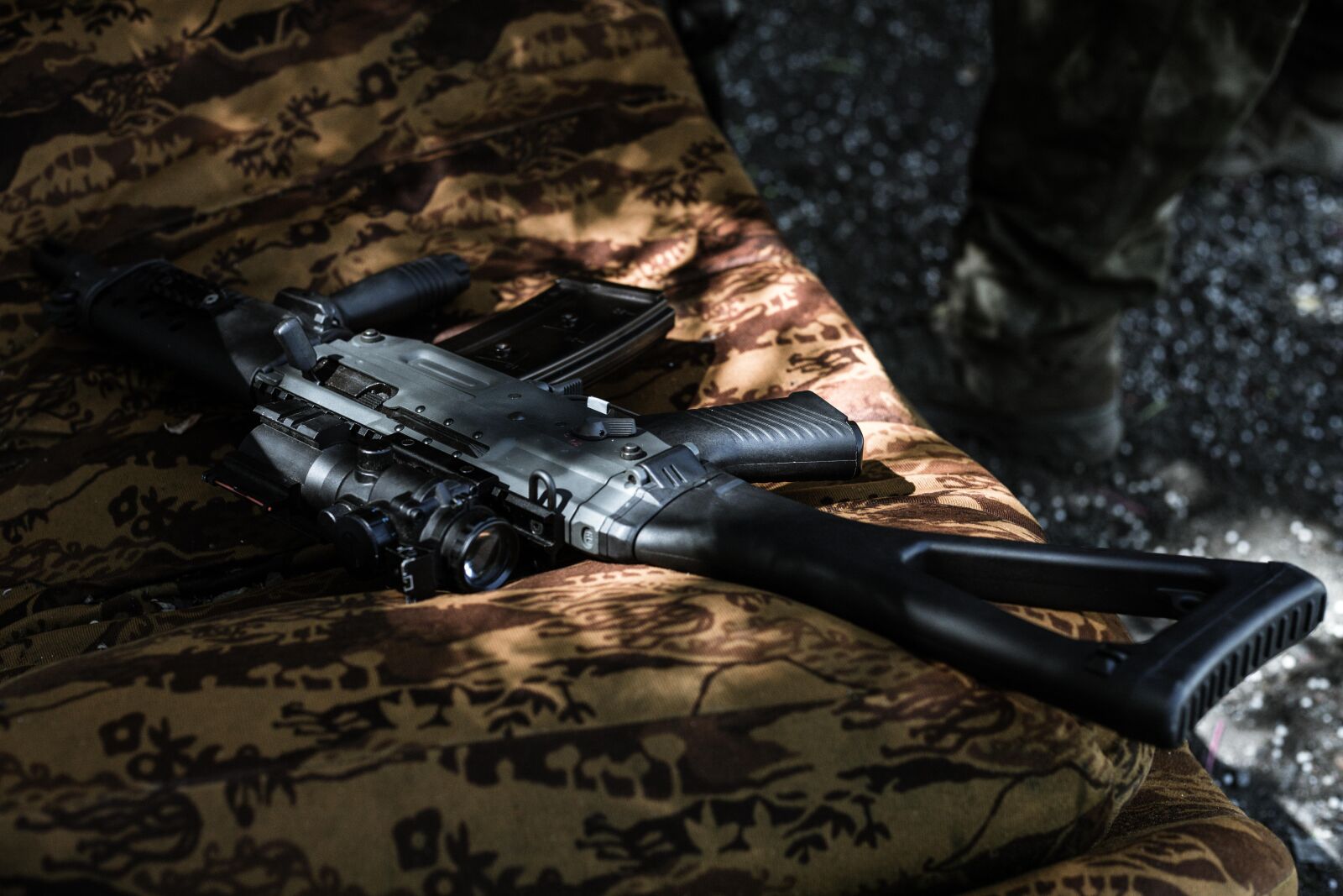 Canon EOS 6D Mark II sample photo. Weapon, couch, sofa photography