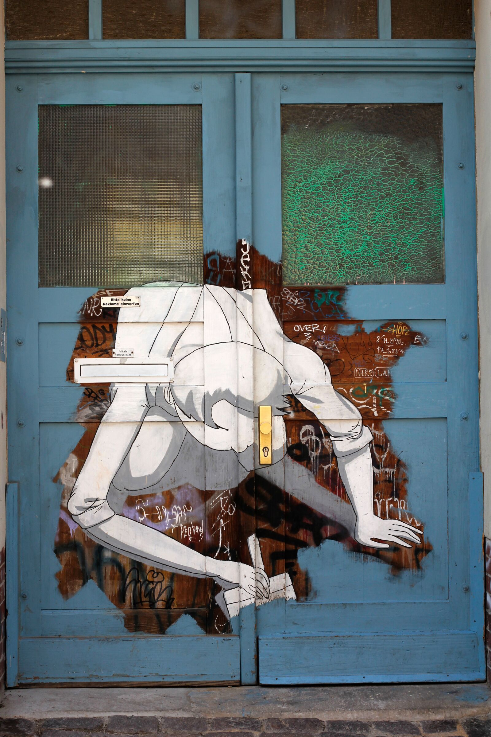 Canon EOS 60D + Canon EF 50mm F1.4 USM sample photo. Door, graffiti, painting photography