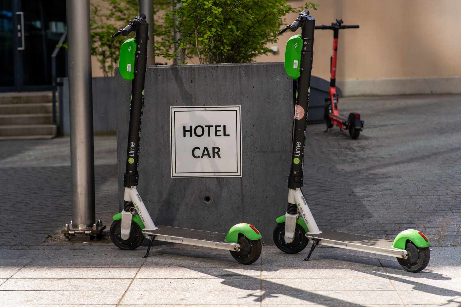Sony a7R IV + Tokina atx-m 85mm F1.8 FE sample photo. Hotel car scooter photography