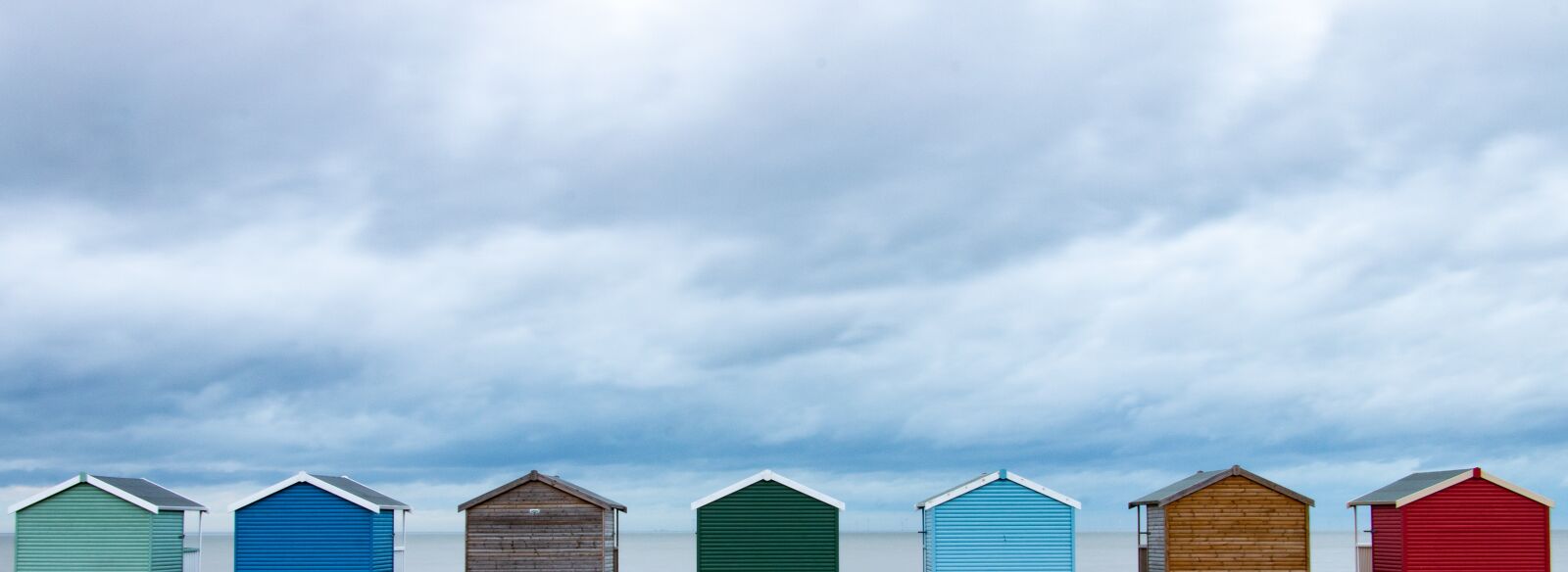 Canon EOS 70D sample photo. Sky, storm, huts photography