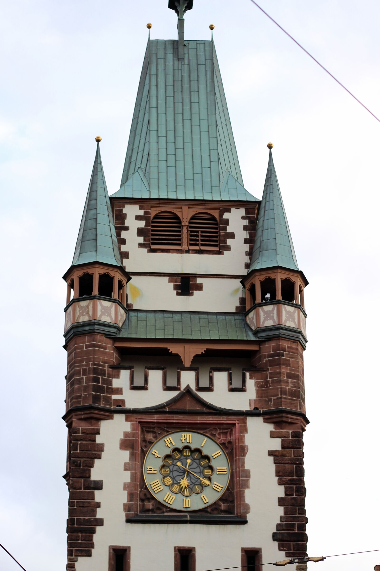 Canon EOS 600D (Rebel EOS T3i / EOS Kiss X5) + Canon EF 50mm F1.8 STM sample photo. Martinstor, freiburg, architecture photography