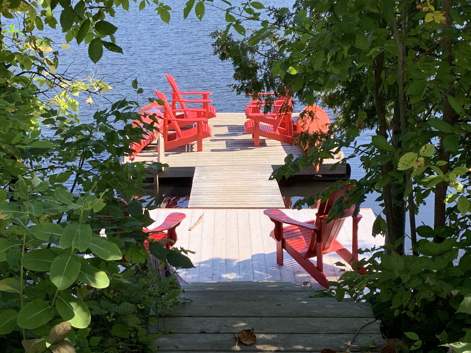 iPhone XR back camera 4.25mm f/1.8 sample photo. The dock hidden, chairs photography