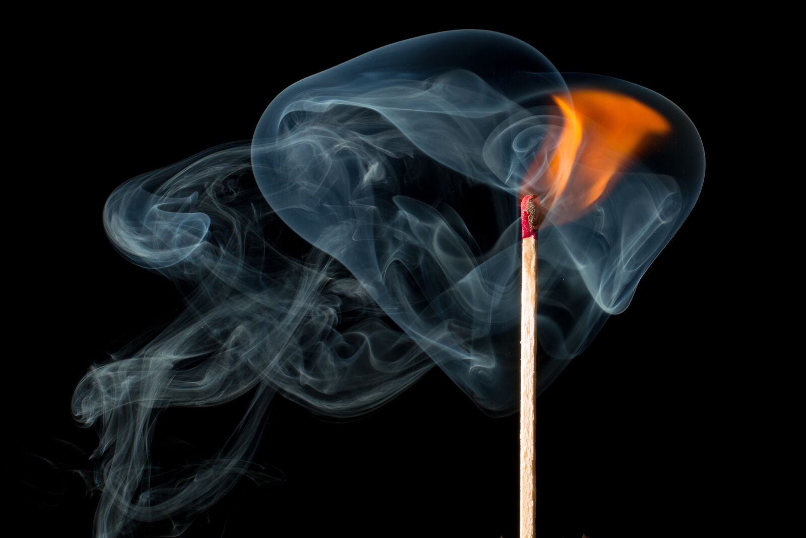 Canon EOS 600D (Rebel EOS T3i / EOS Kiss X5) + Canon EF 50mm F1.4 USM sample photo. Fire, smoke, match photography