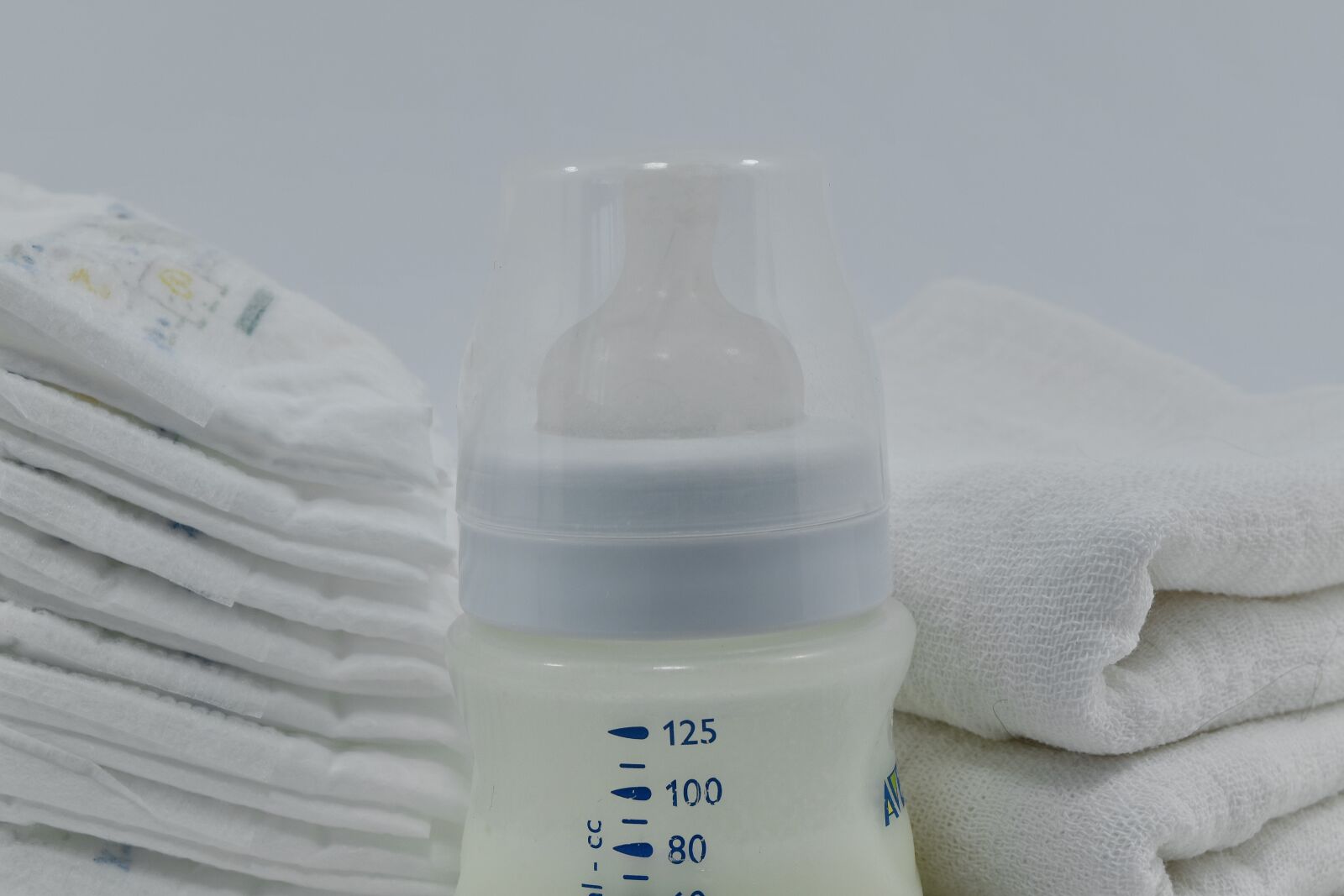 Nikon D5500 sample photo. Baby, cotton, diaper, milk photography