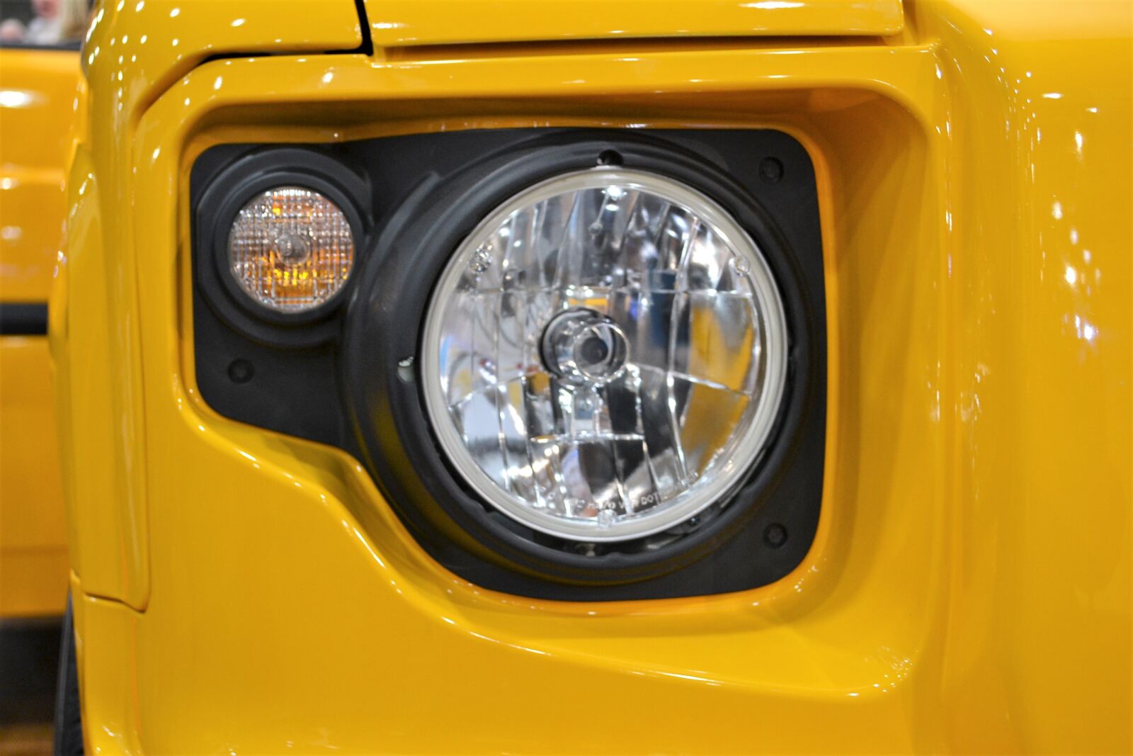 Nikon D3100 sample photo. Suv headlamp, headlight, yellow photography