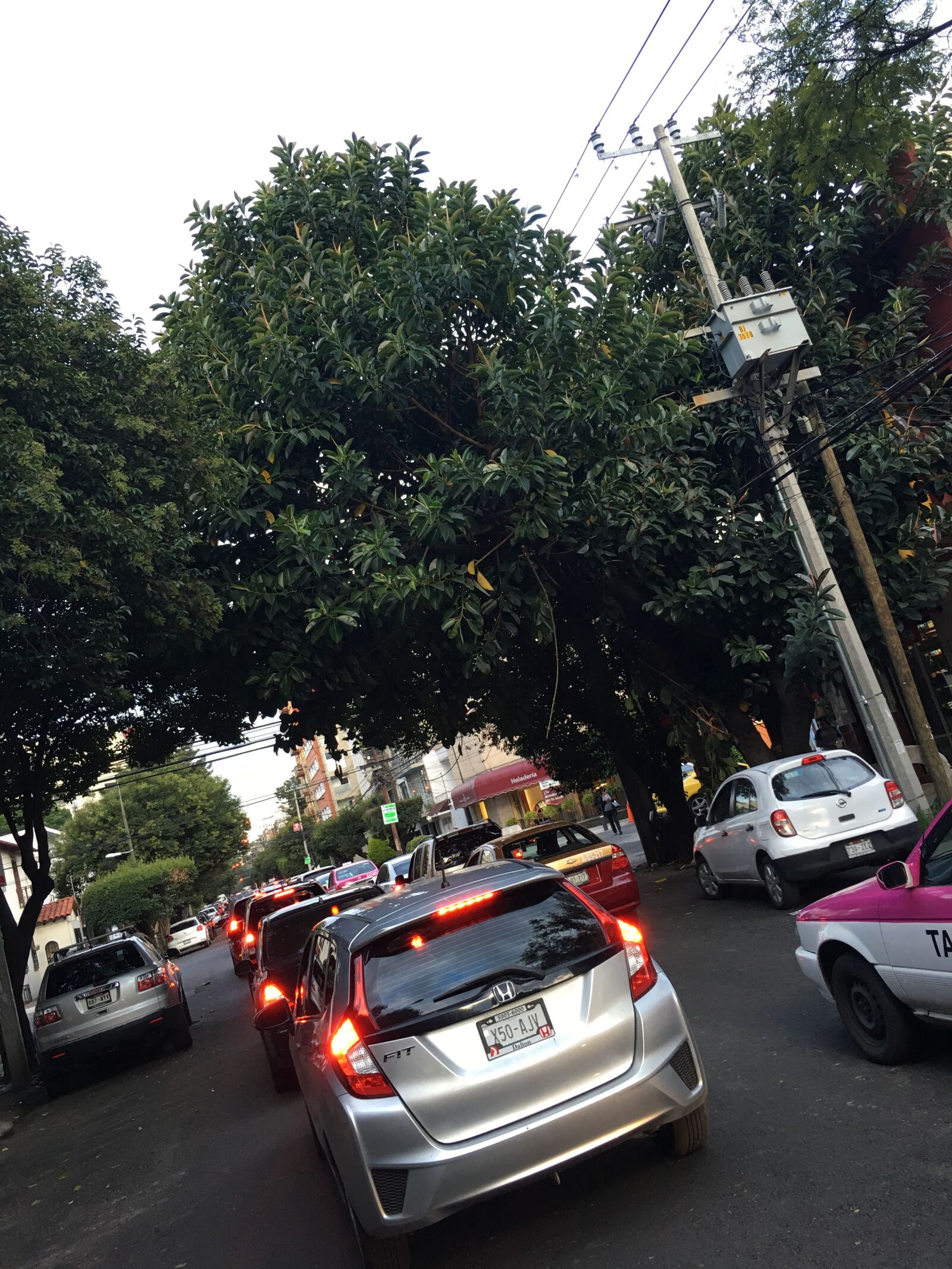 iPhone 6s Plus back camera 4.15mm f/2.2 sample photo. Car, street, lights photography