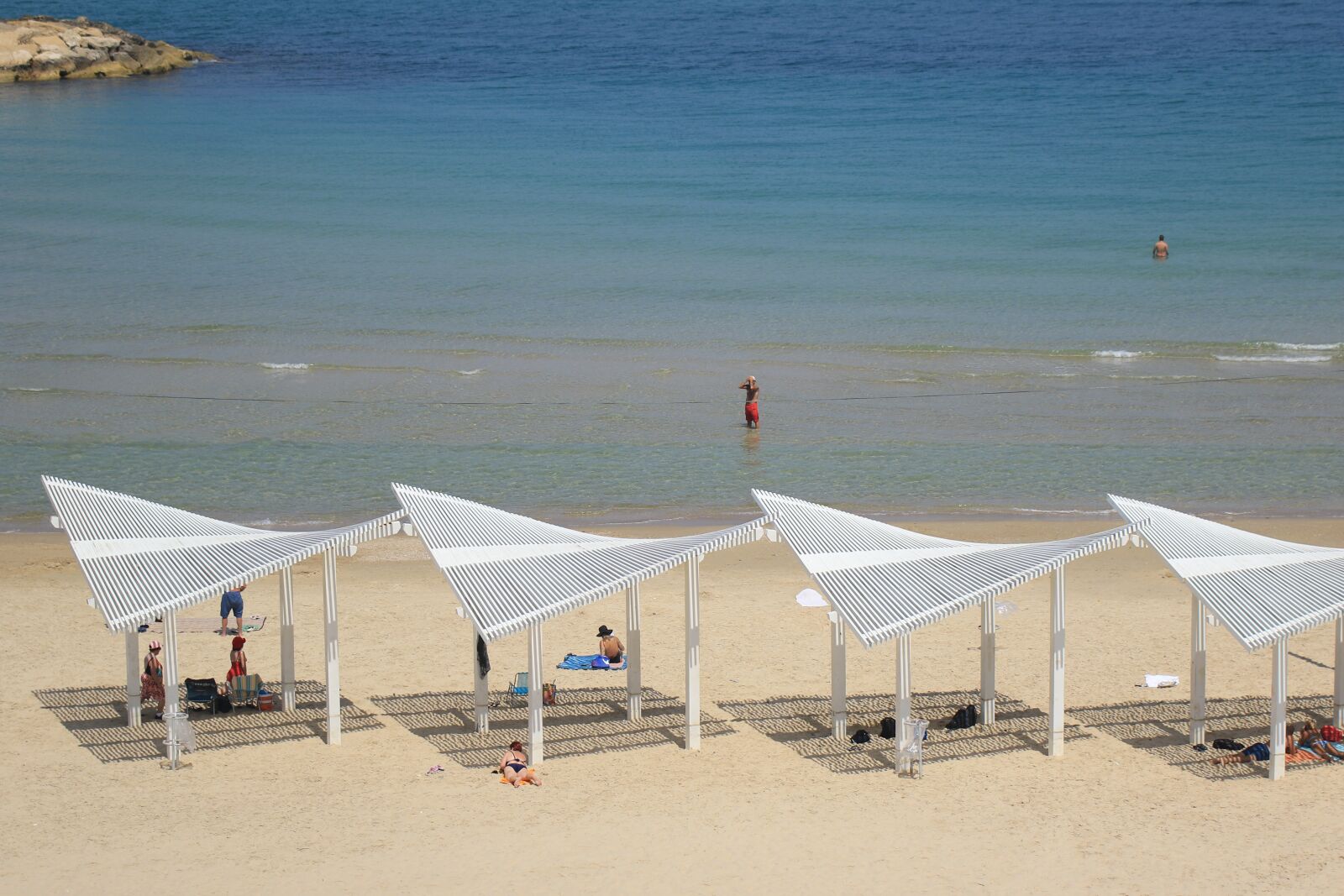 Canon EOS 7D Mark II sample photo. Beach, sand, shade photography