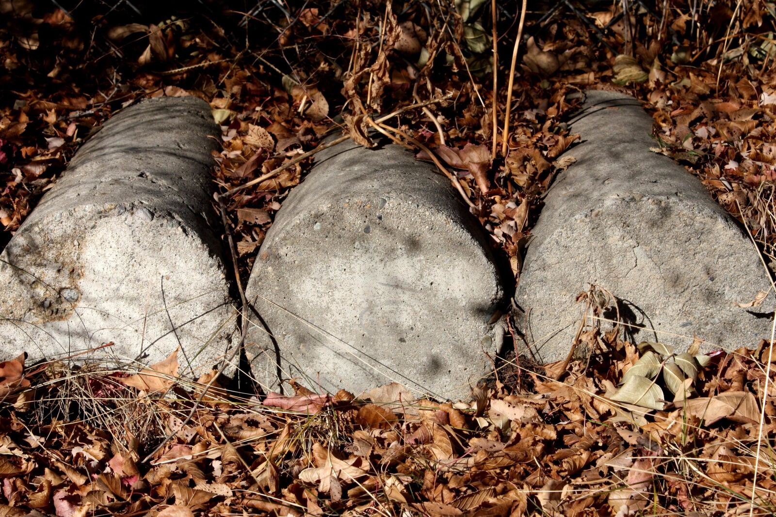 f/3.5-5.6 IS sample photo. Cylindrical, cement blocks, concrete photography