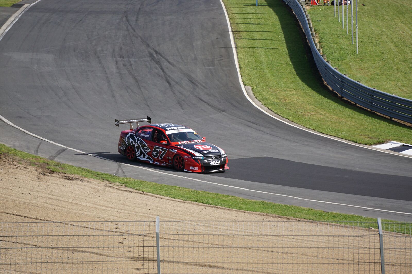 Sony E 55-210mm F4.5-6.3 OSS sample photo. Cars, car racing, racing photography