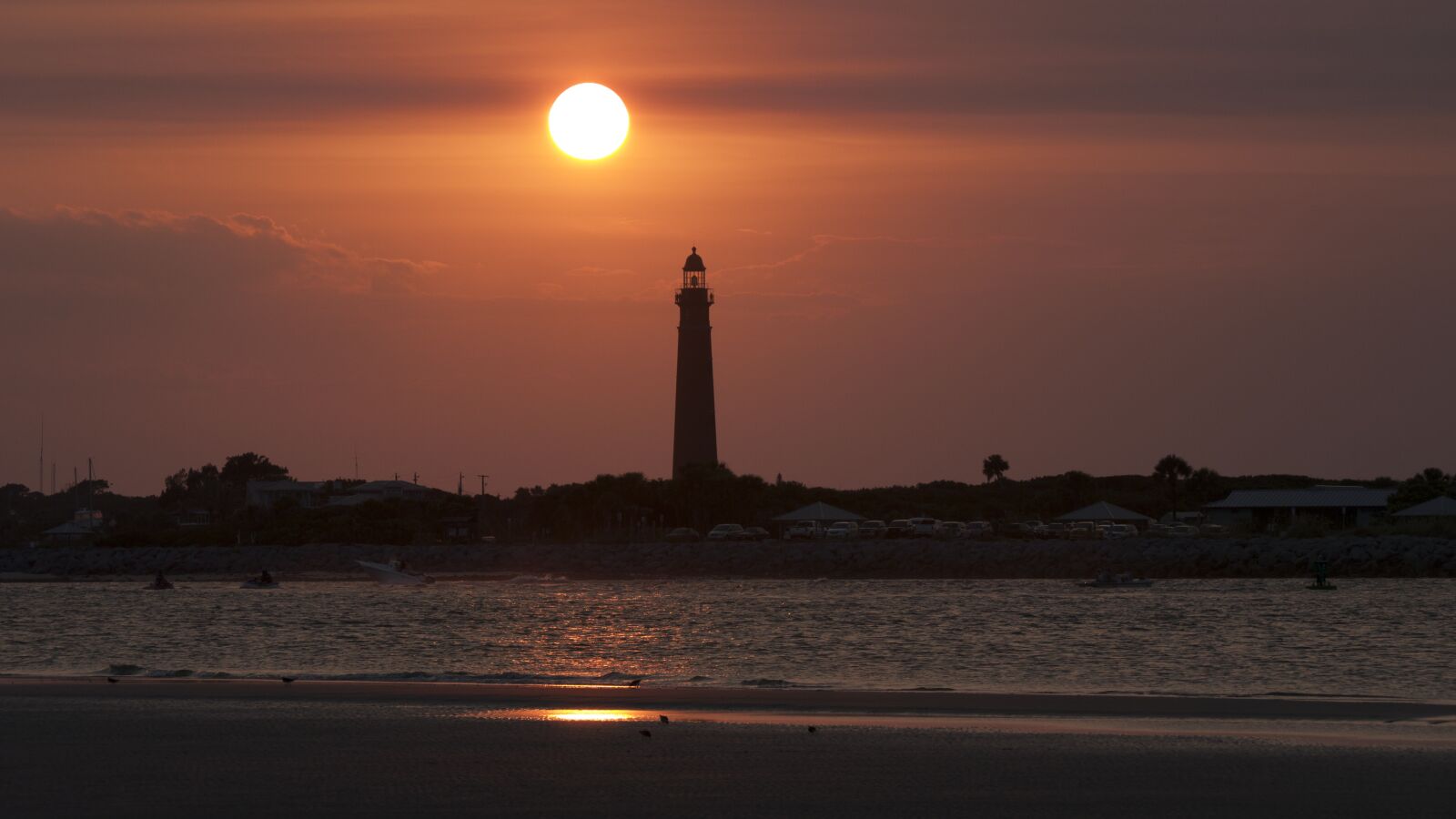 Panasonic Lumix G Vario 45-200mm F4-5.6 OIS sample photo. Lighthouse, sunset, beach photography