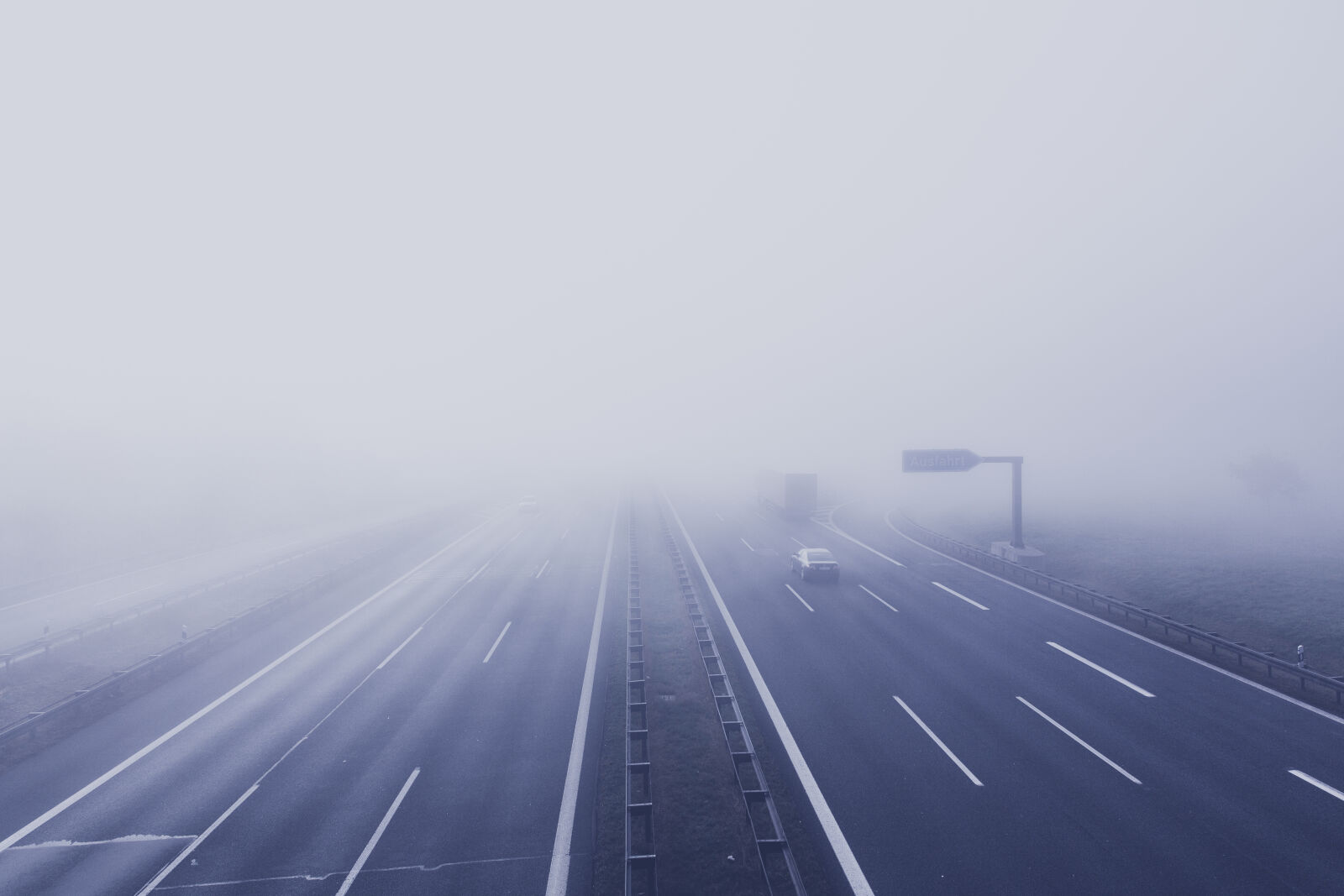 Canon EF 24-70mm F2.8L II USM sample photo. Light, road, landscape, sign photography