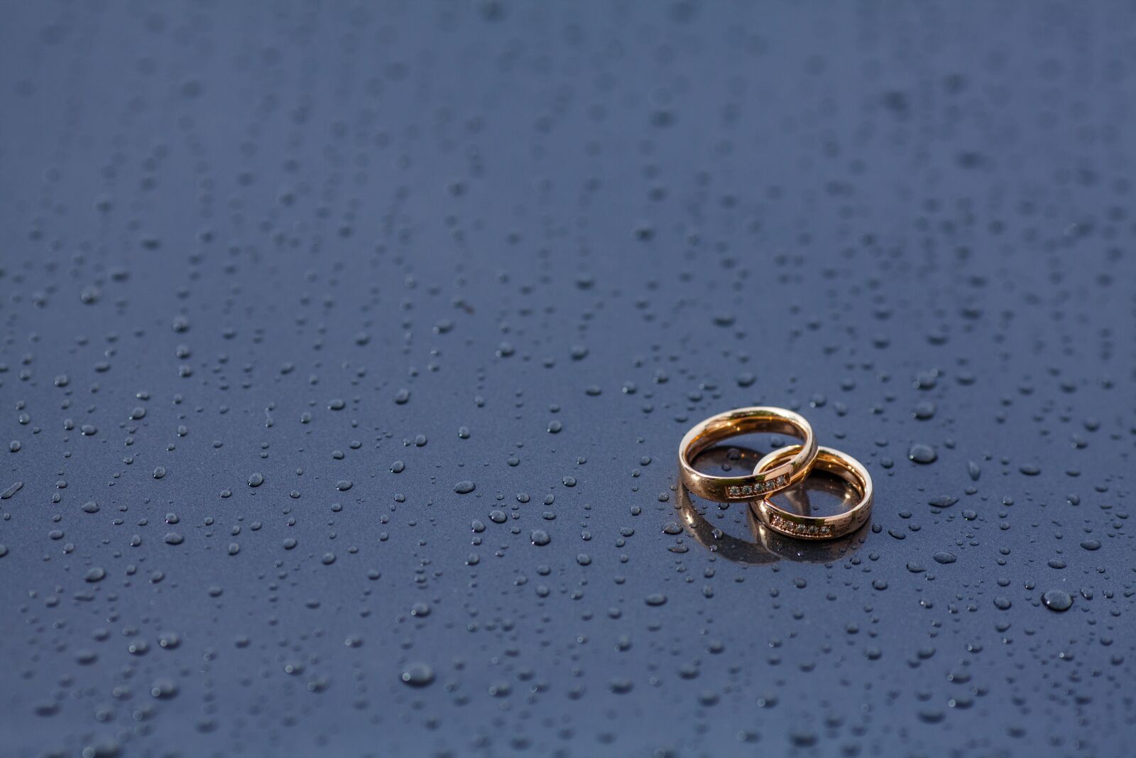 Canon EOS 5D Mark II + Canon EF 135mm F2L USM sample photo. Rings, wedding, gold photography