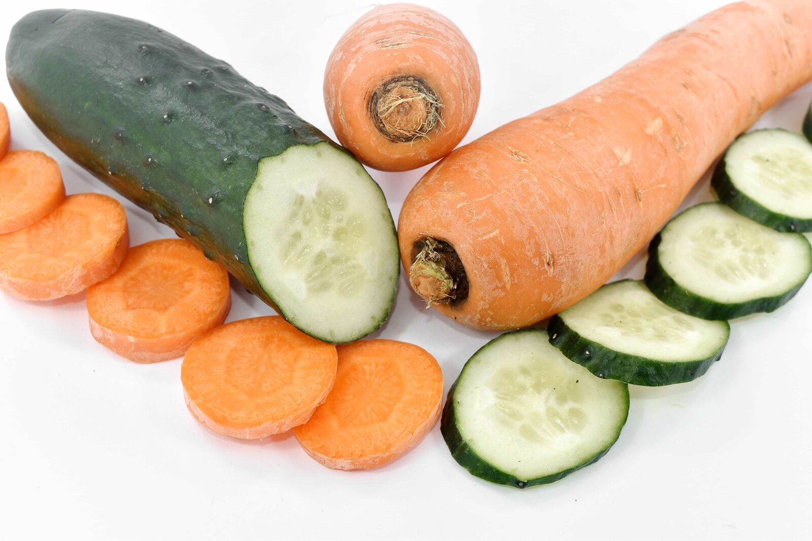 Nikon D5500 sample photo. Cross section, cucumber, slices photography