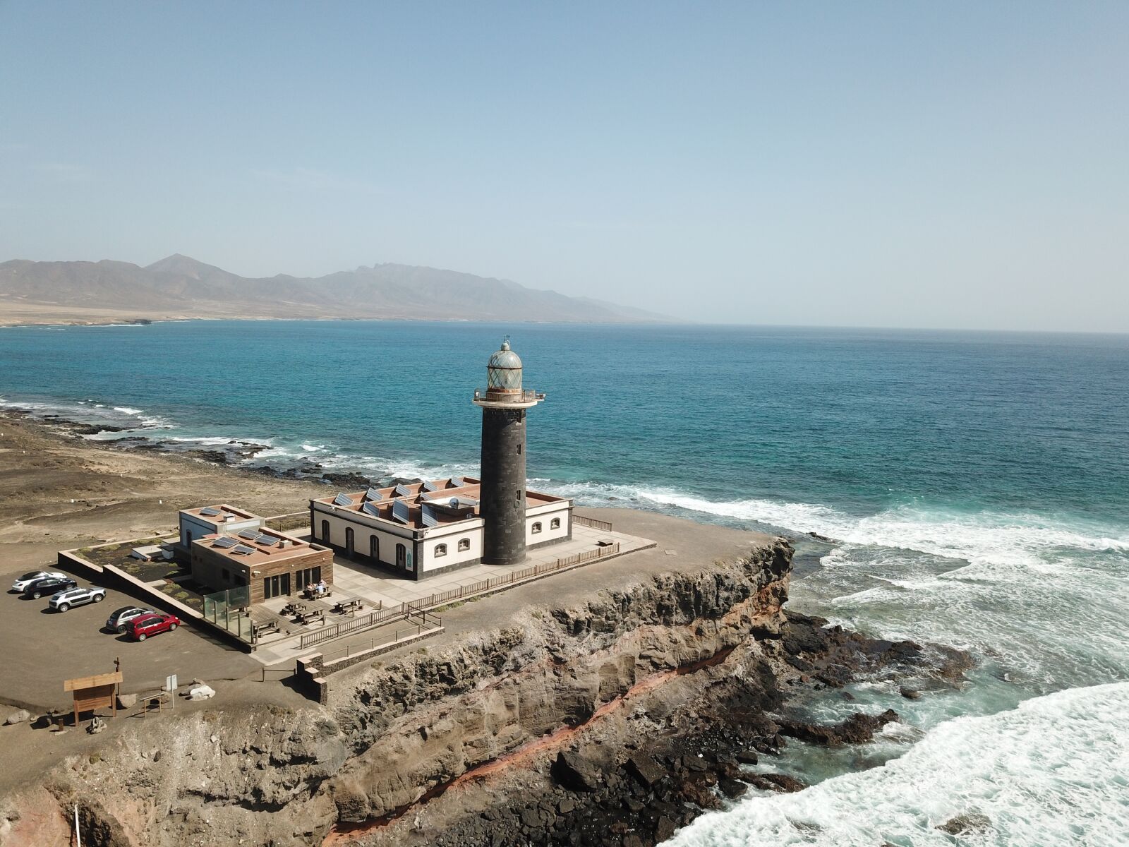 DJI FC220 sample photo. Fuerteventura, lighthouse, sea photography