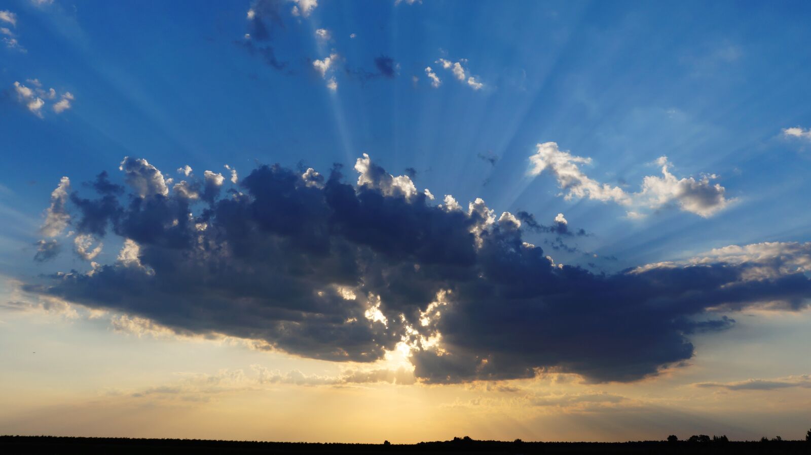 Sony Alpha a3000 + Sony E 18-55mm F3.5-5.6 OSS sample photo. Clouds, the sun, sky photography