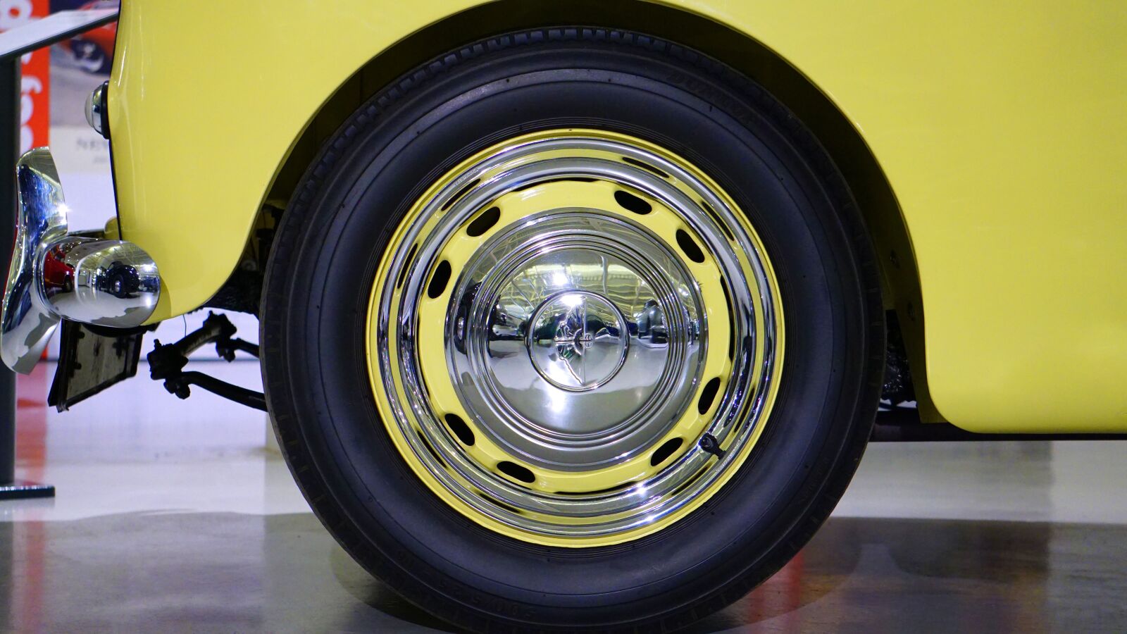 Sony E 55-210mm F4.5-6.3 OSS sample photo. Car, wheel, classic photography