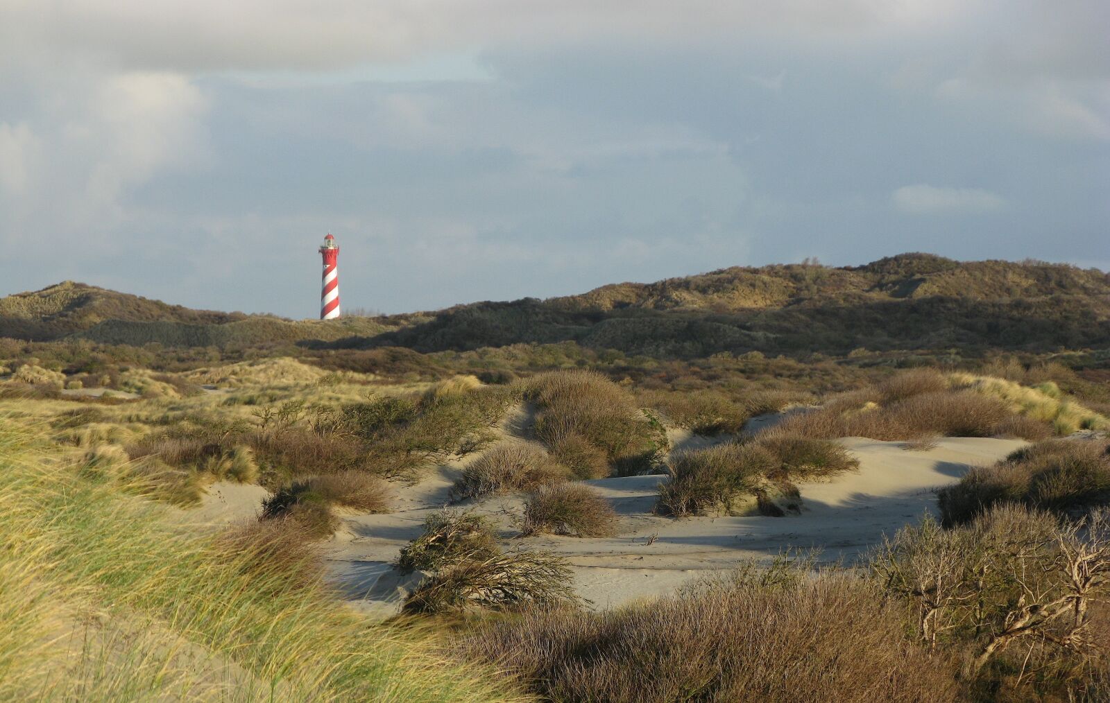 Canon POWERSHOT A650 IS sample photo. Lighthouse, dunes, sea photography