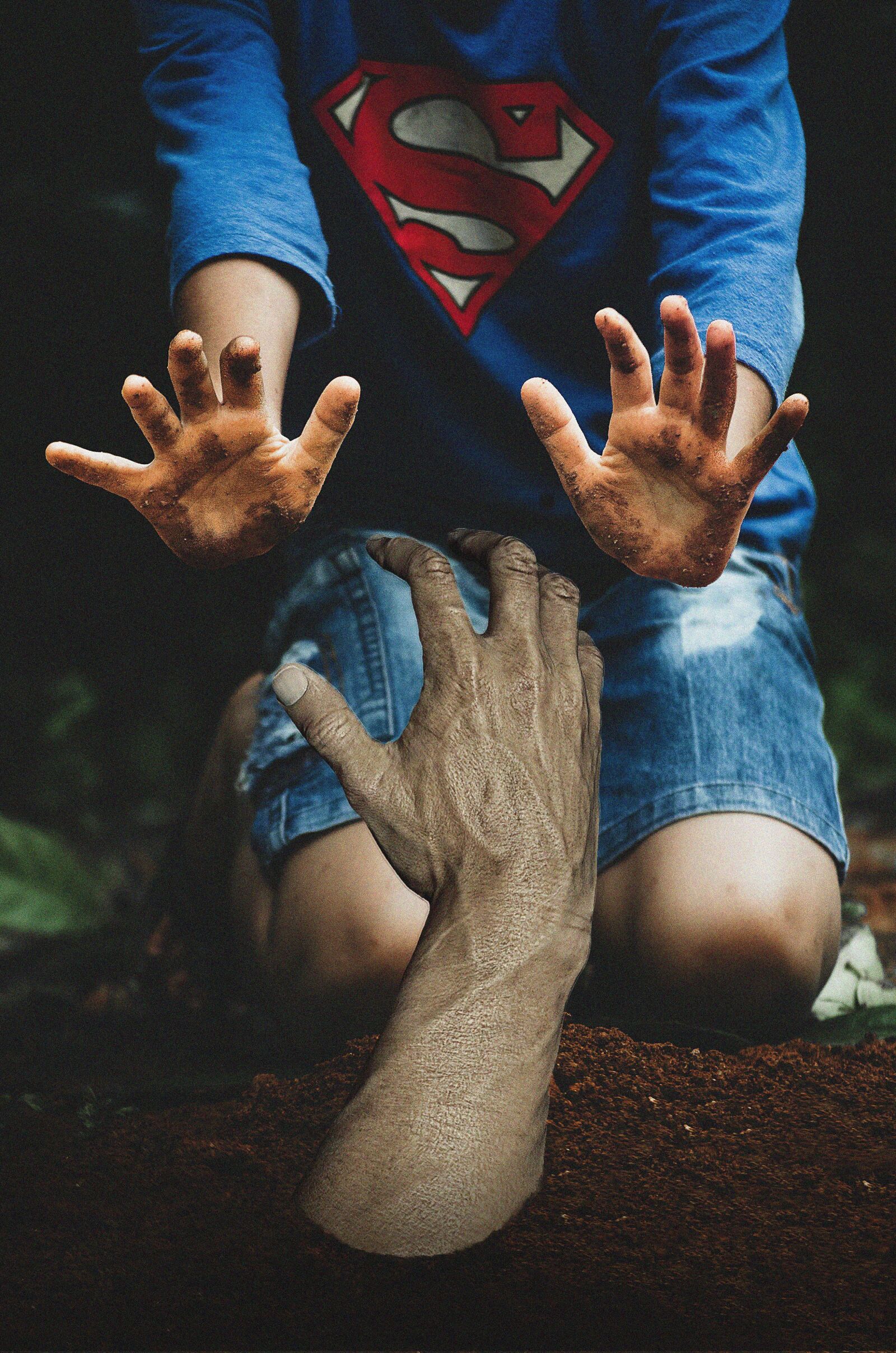 Nikon D5100 sample photo. Hands, boy, ground photography