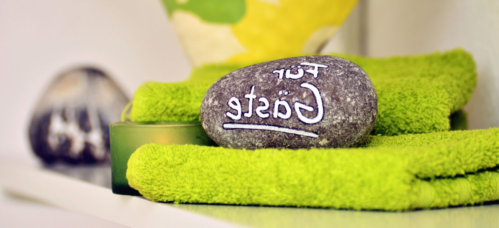Nikon D5200 sample photo. Stone, towel, label, decoration photography