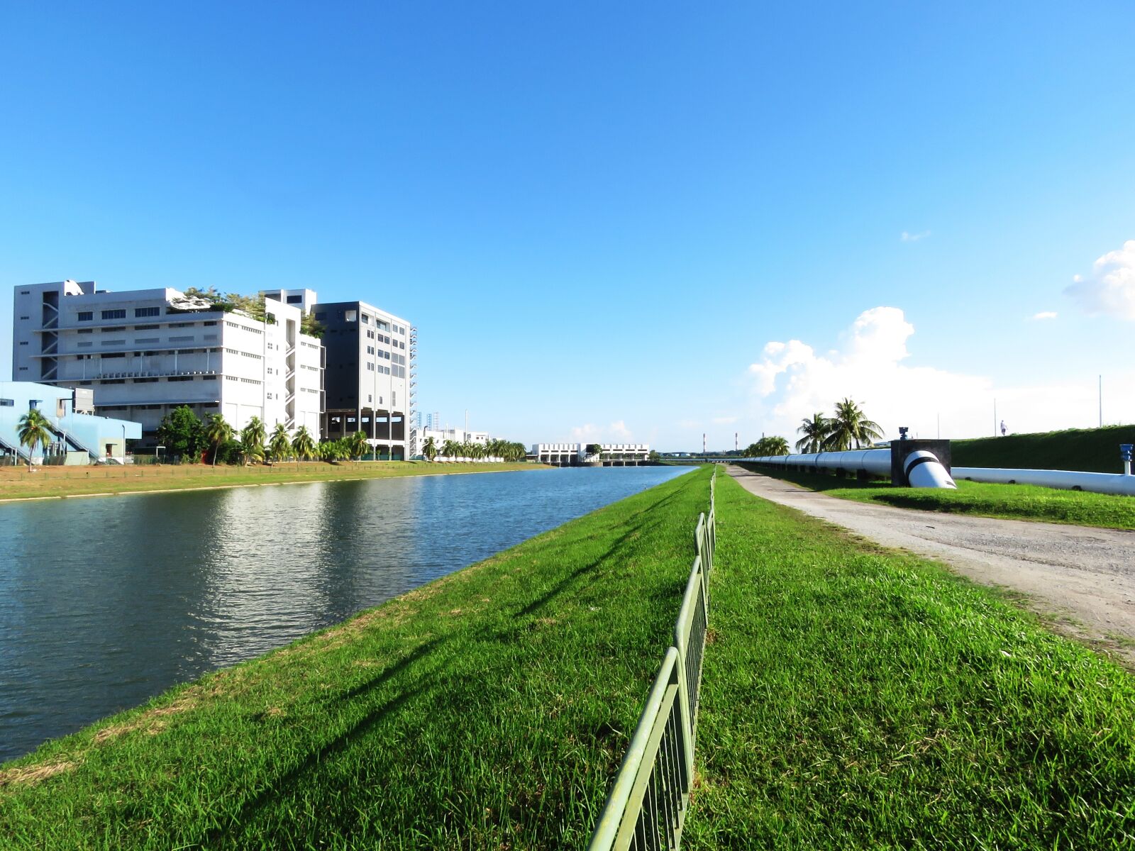 Canon PowerShot SX60 HS sample photo. River, land, building photography