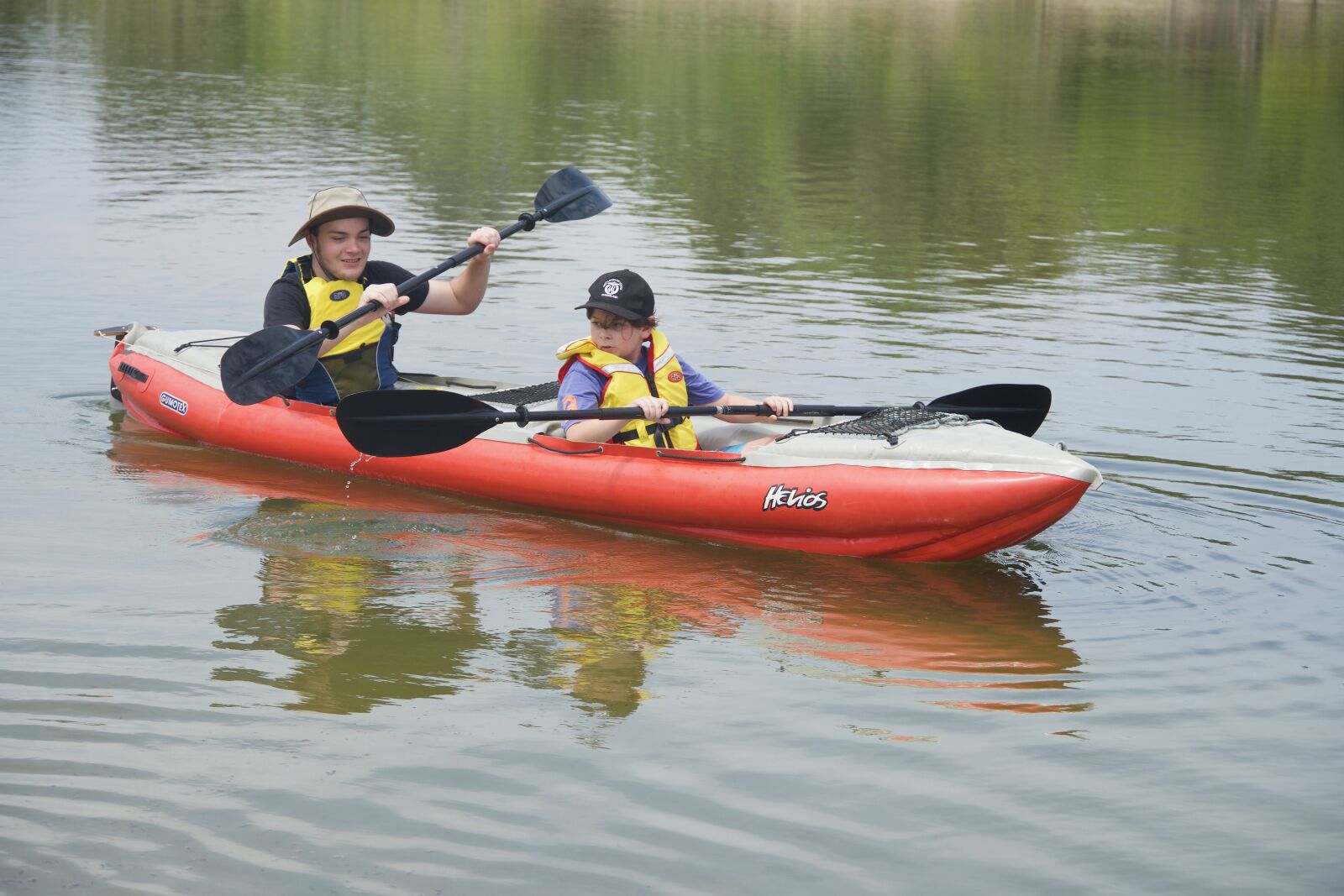 Sony E 18-135mm F3.5-5.6 OSS sample photo. Paddlers, kayaking, paddles photography