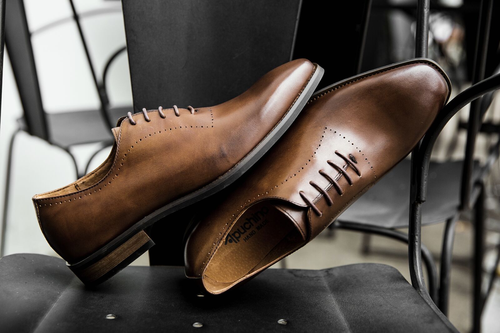 Canon EF 24-70mm F2.8L II USM sample photo. Shoes men, shoe, shine photography