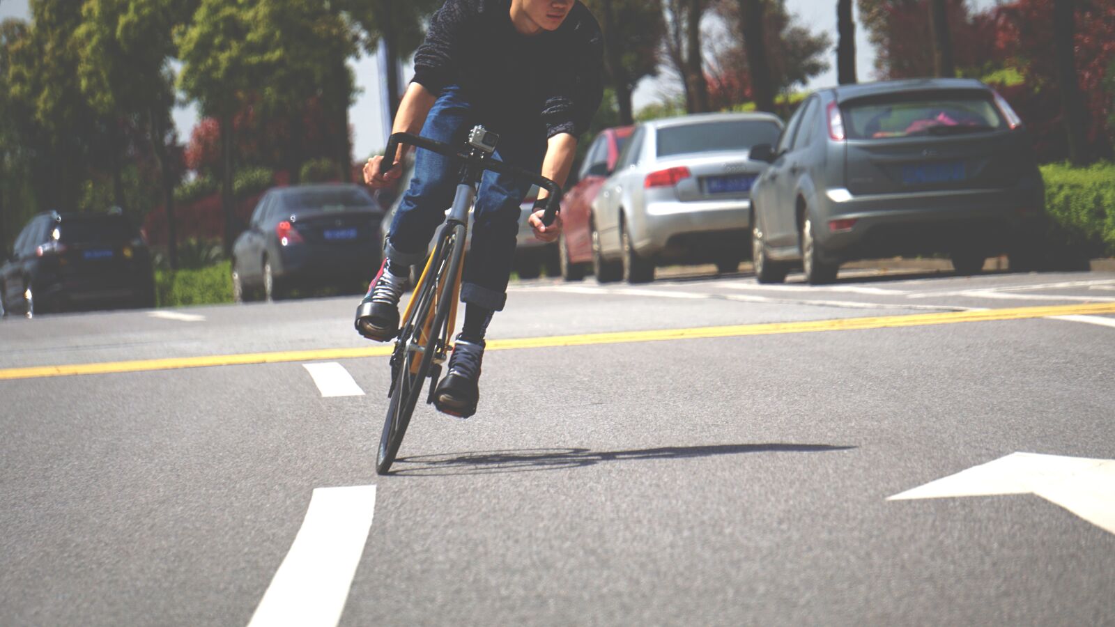 Sony E 55-210mm F4.5-6.3 OSS sample photo. Fixed gear, sport, bike photography