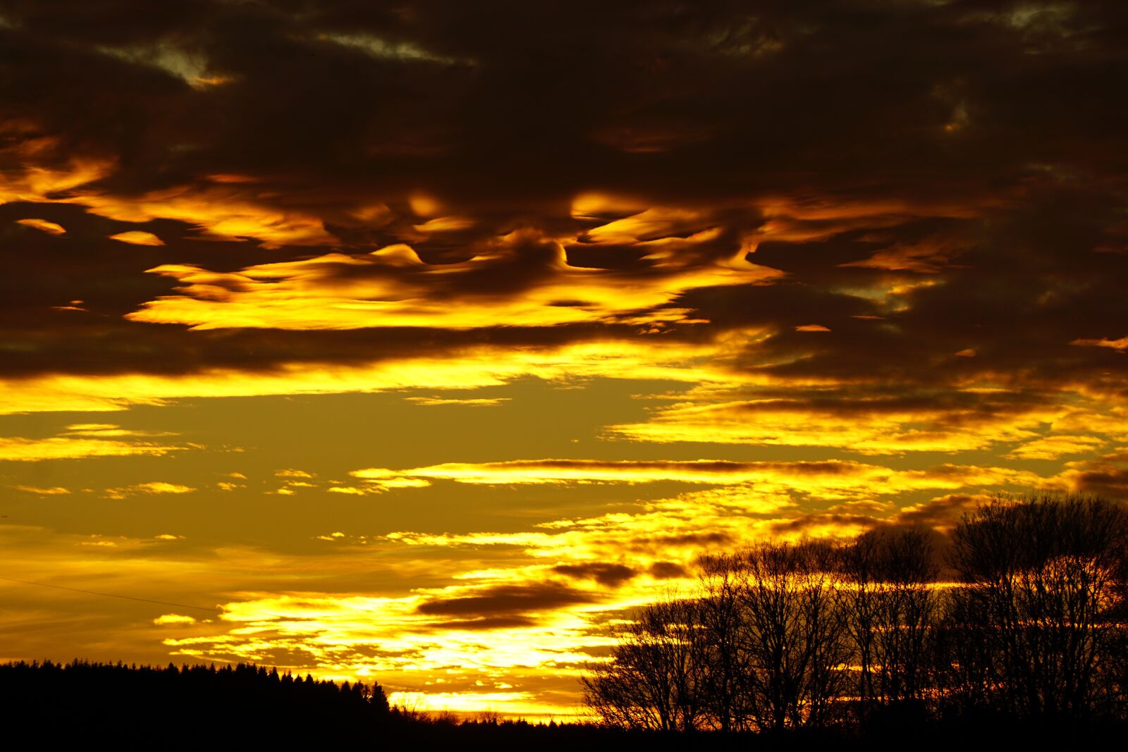 Sony E 55-210mm F4.5-6.3 OSS sample photo. Sunset, abendstimmung, clouds photography