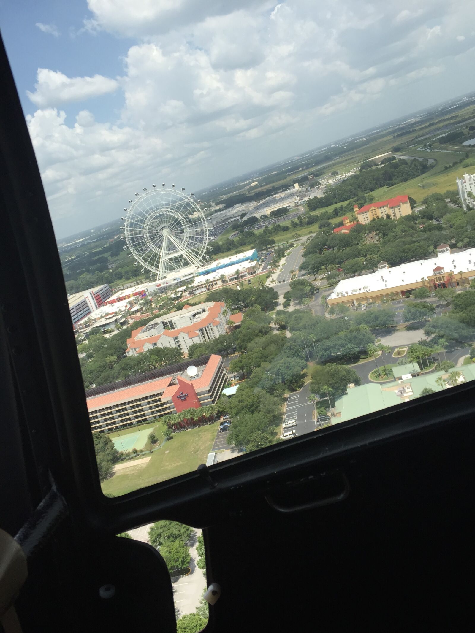 Apple iPhone 6 sample photo. Above, ferris, wheel, fly photography