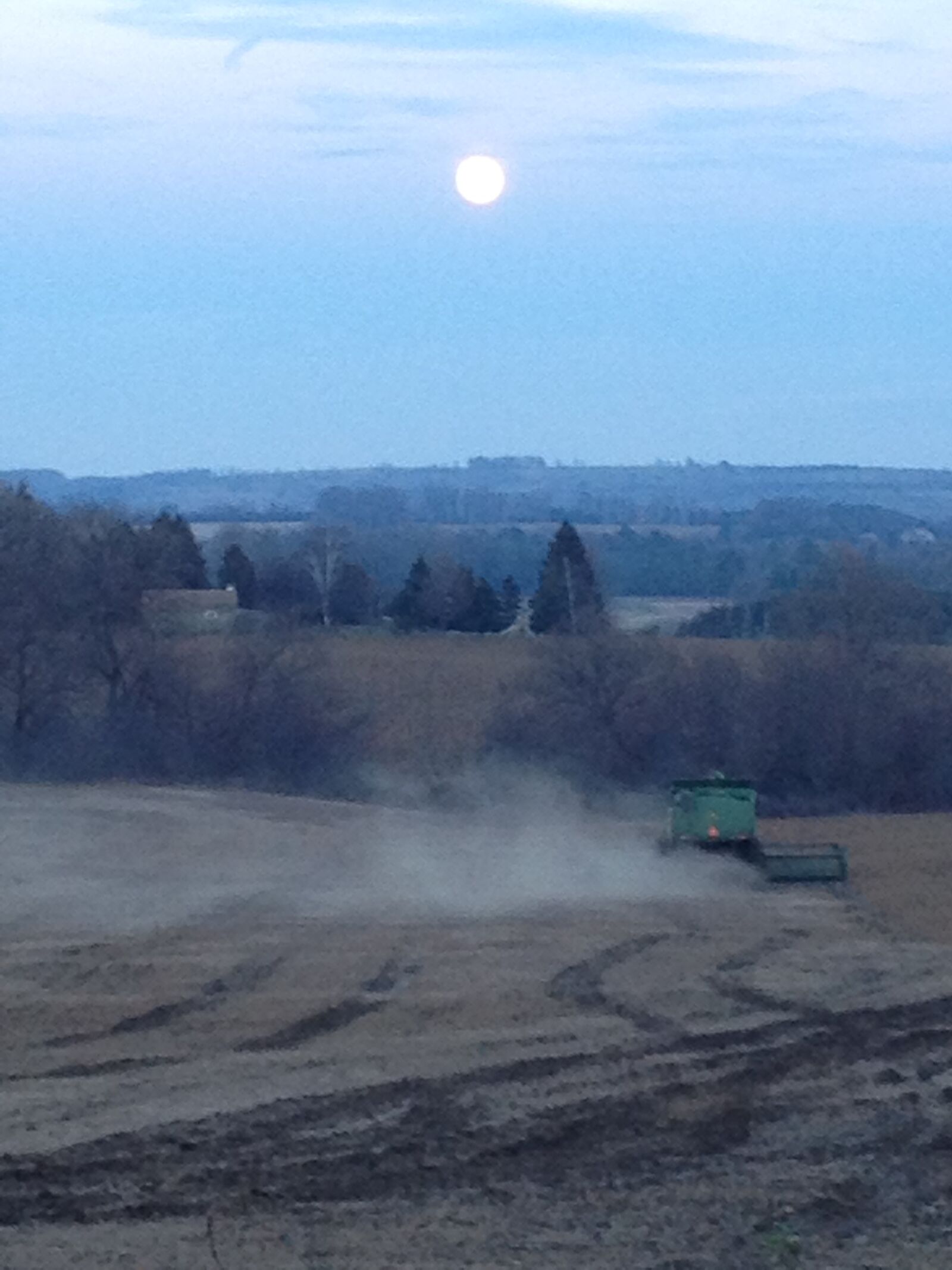 iPhone 4S back camera 4.28mm f/2.4 sample photo. Summer, evening, tractor, seeding photography