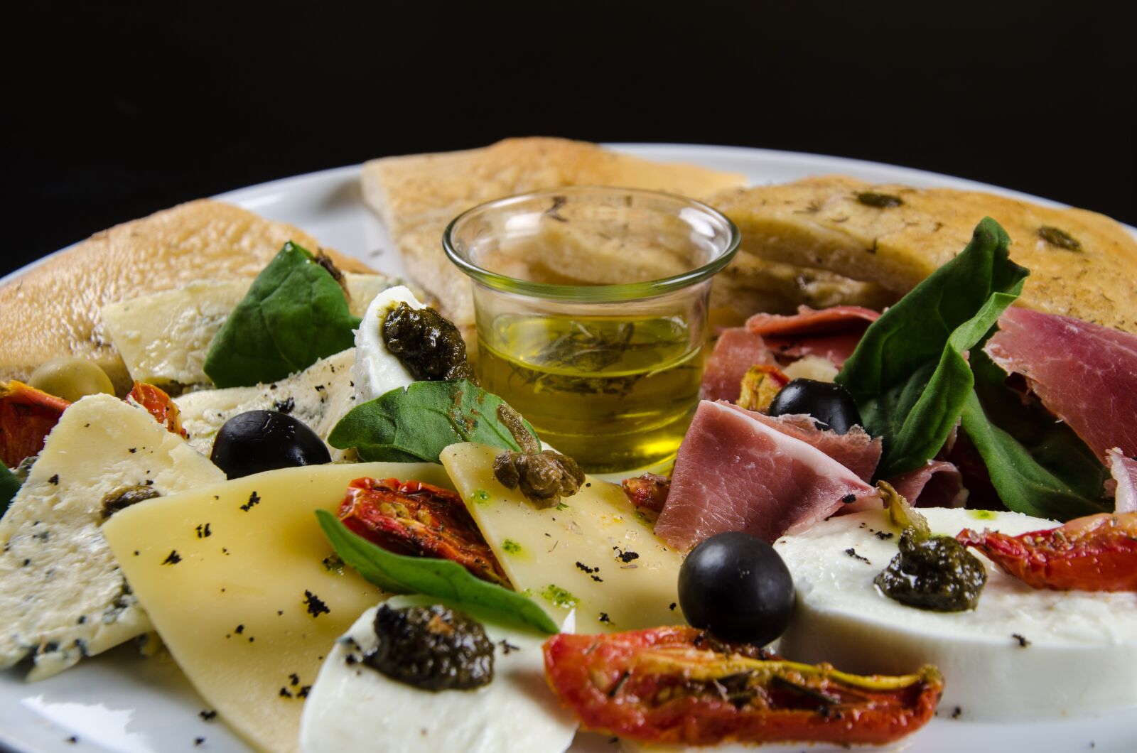 Nikon D7000 sample photo. Foccacia with olives, tasting photography