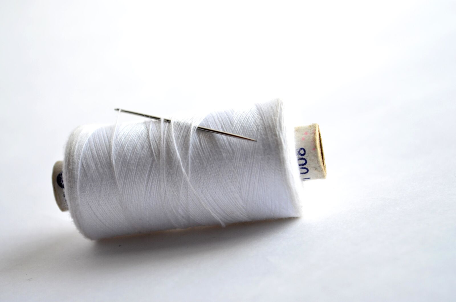 Nikon D5100 sample photo. White, sewing thread, sewing photography