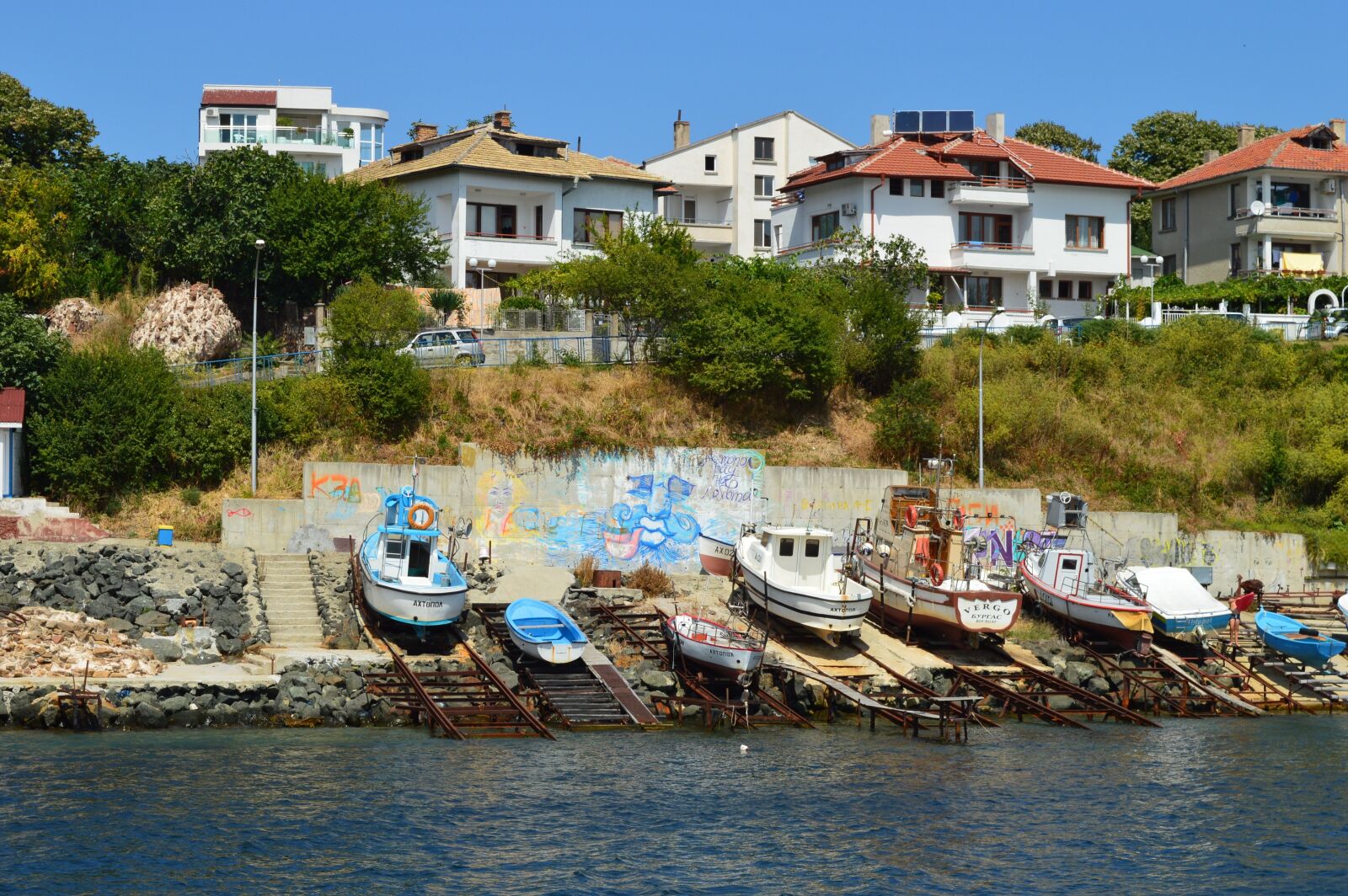 Nikon D3200 sample photo. Boats, graffiti, summer photography