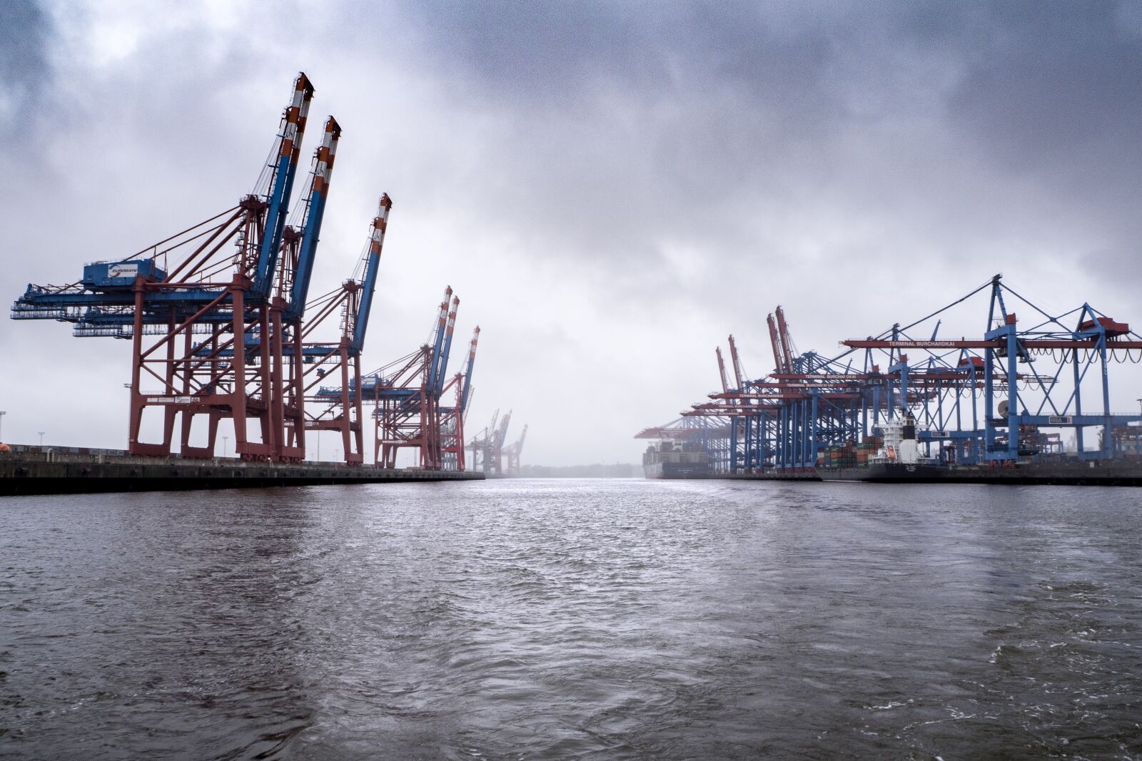 Olympus OM-D E-M10 II sample photo. Port, terminal, cranes photography