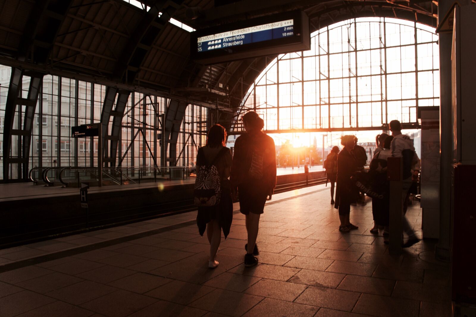 Sony Alpha NEX-5 sample photo. Berlin, couple, sunset, train photography
