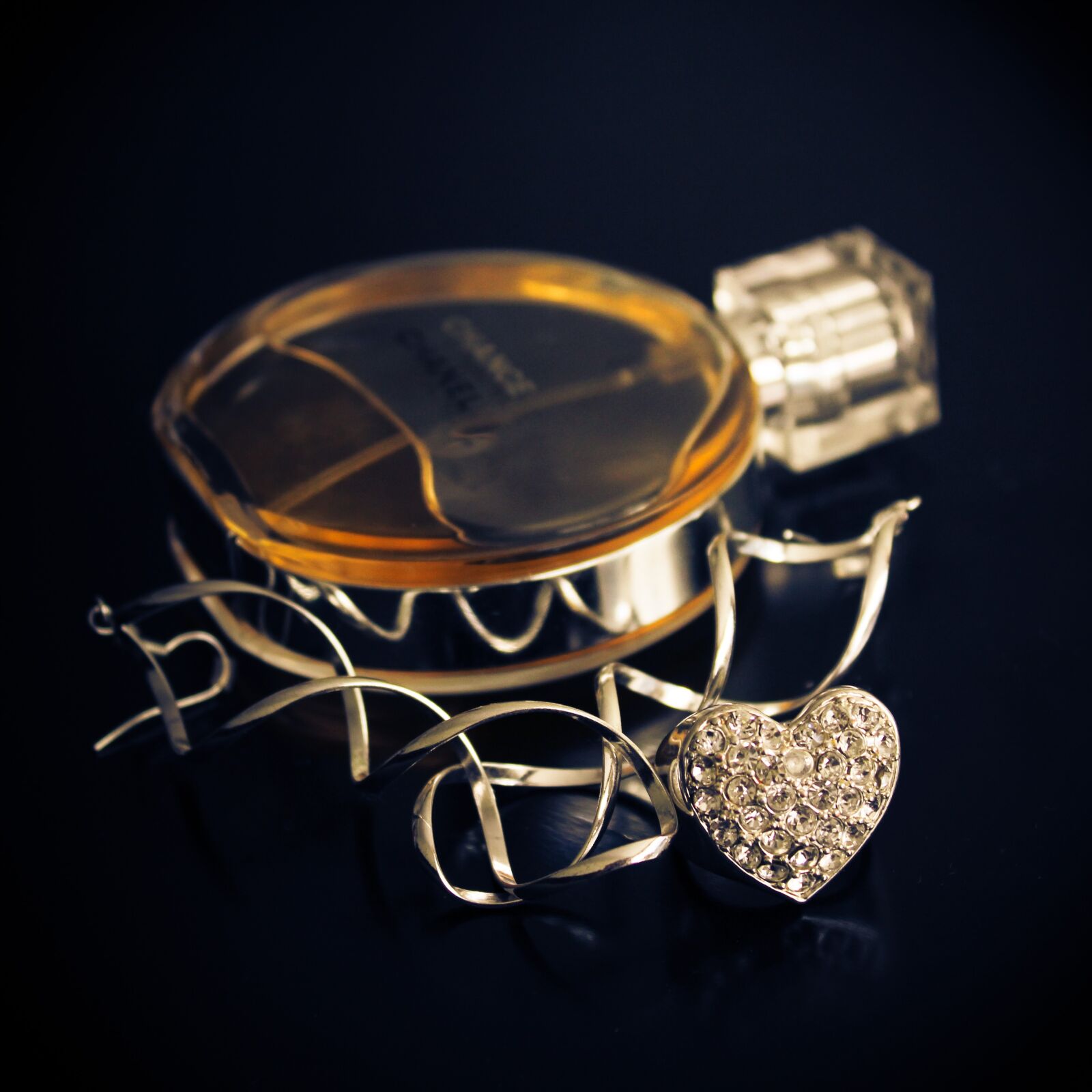 Canon EF-S 18-55mm F3.5-5.6 IS sample photo. Gold, jewelry, perfume photography