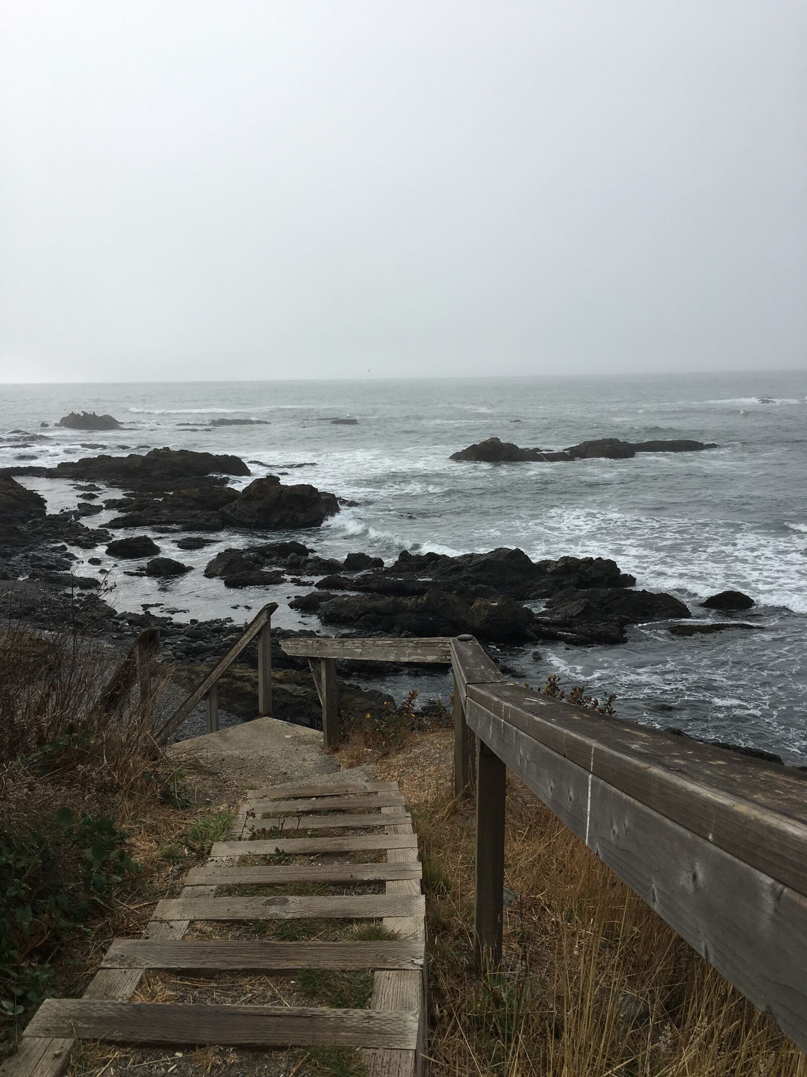 Apple iPhone 6s sample photo. Stairs, ocean, rails photography