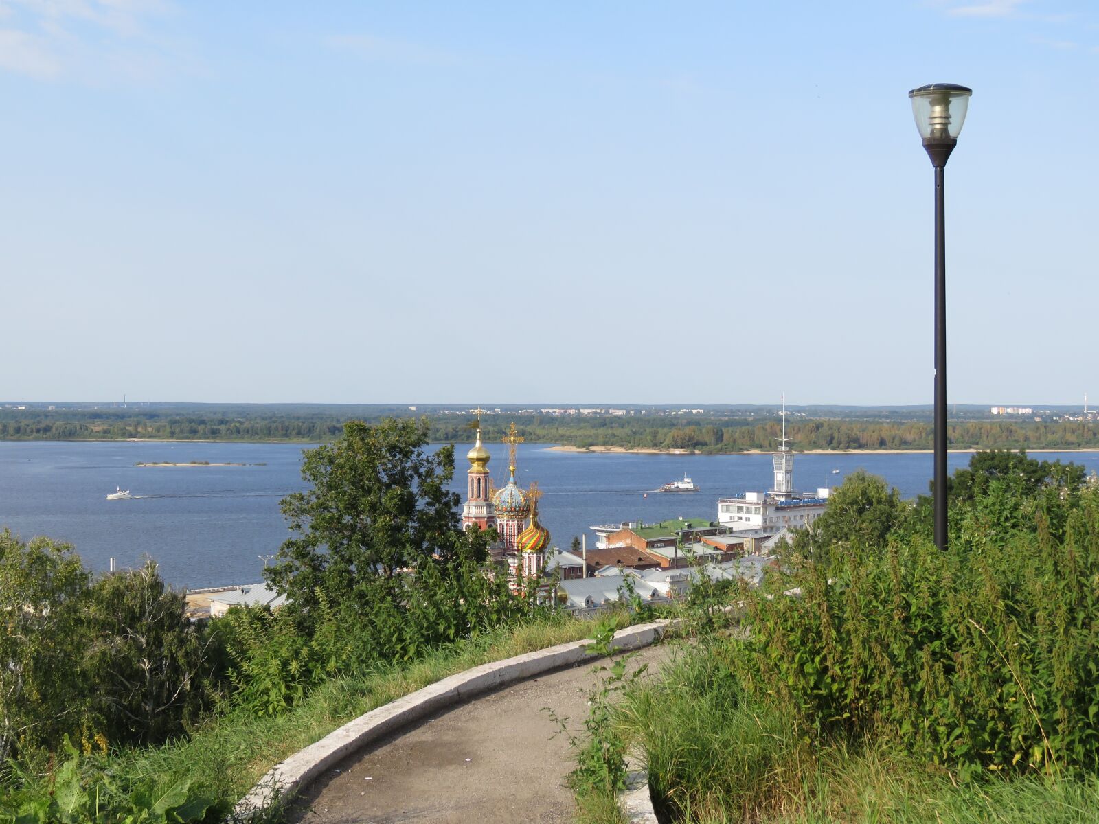 Canon PowerShot SX60 HS sample photo. Volga, quay, church photography