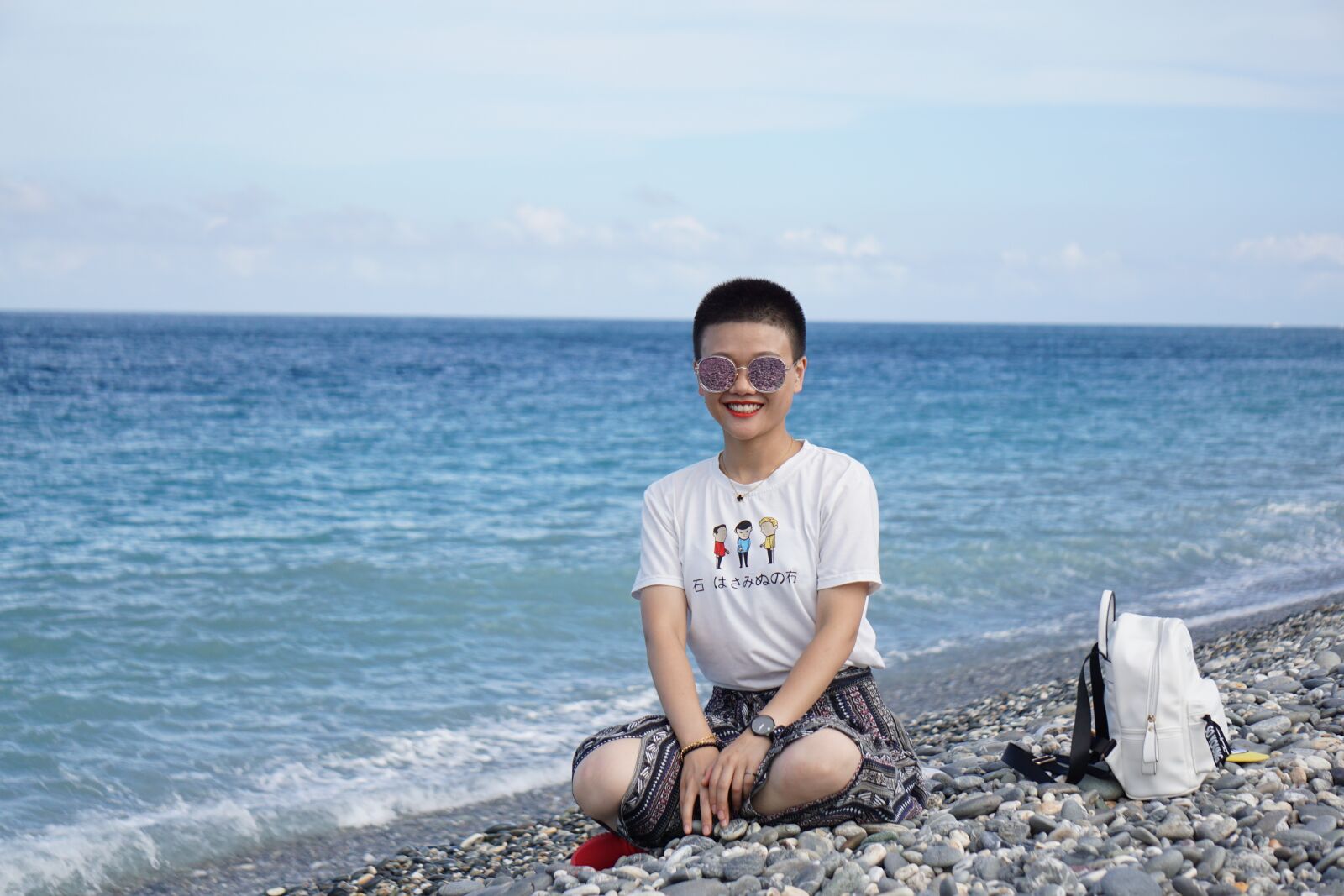 Sony E 55-210mm F4.5-6.3 OSS sample photo. Peaceful, happy, sea photography